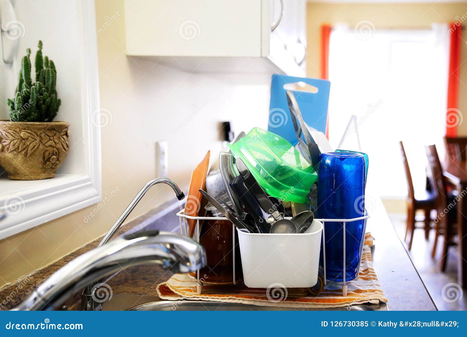Dishes Drying on a Kitchen Counter Stock Image Image of dinnerware