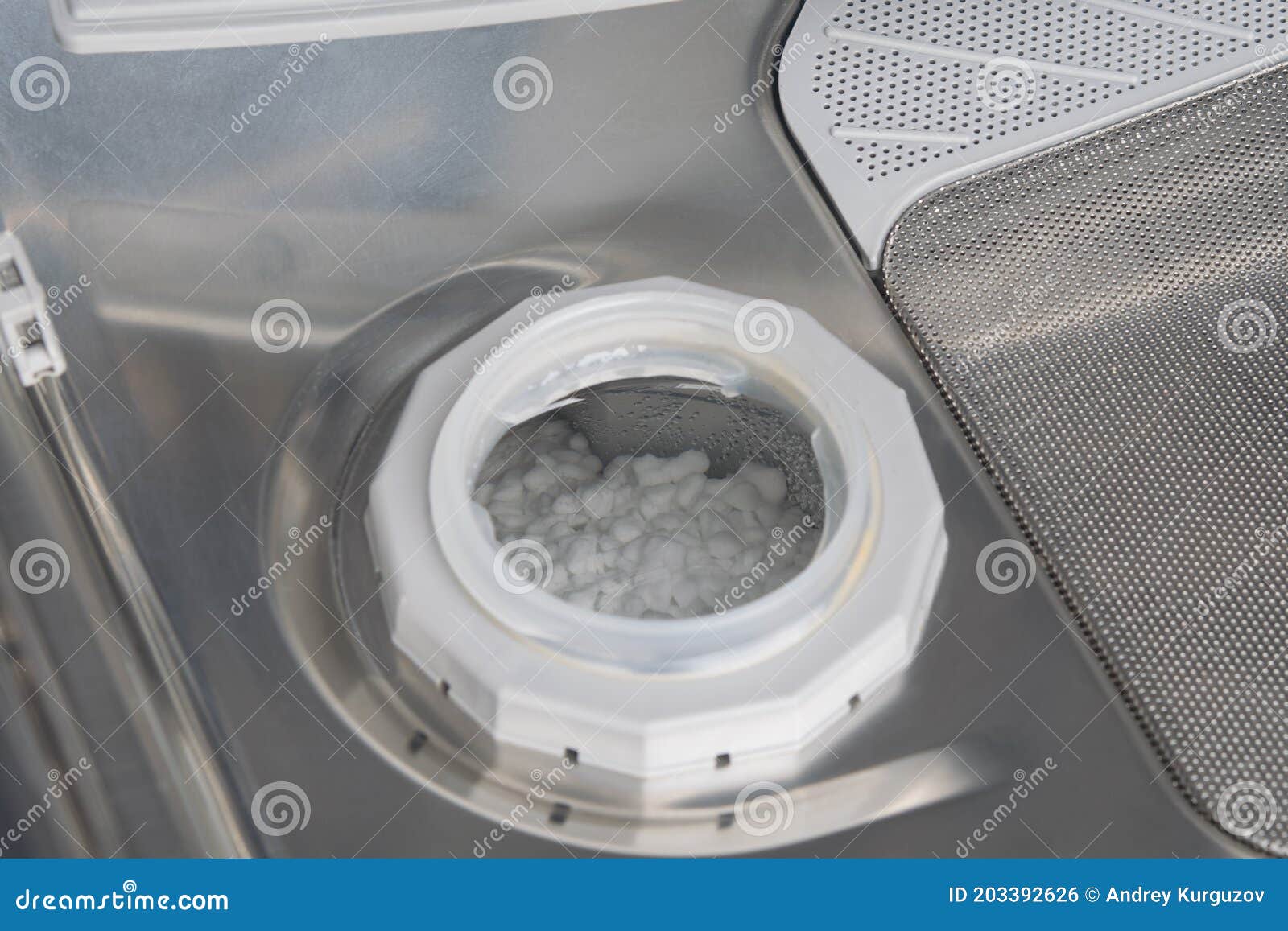 Dishwasher, Salt Compartment, Open, for Softening Water Stock Photo