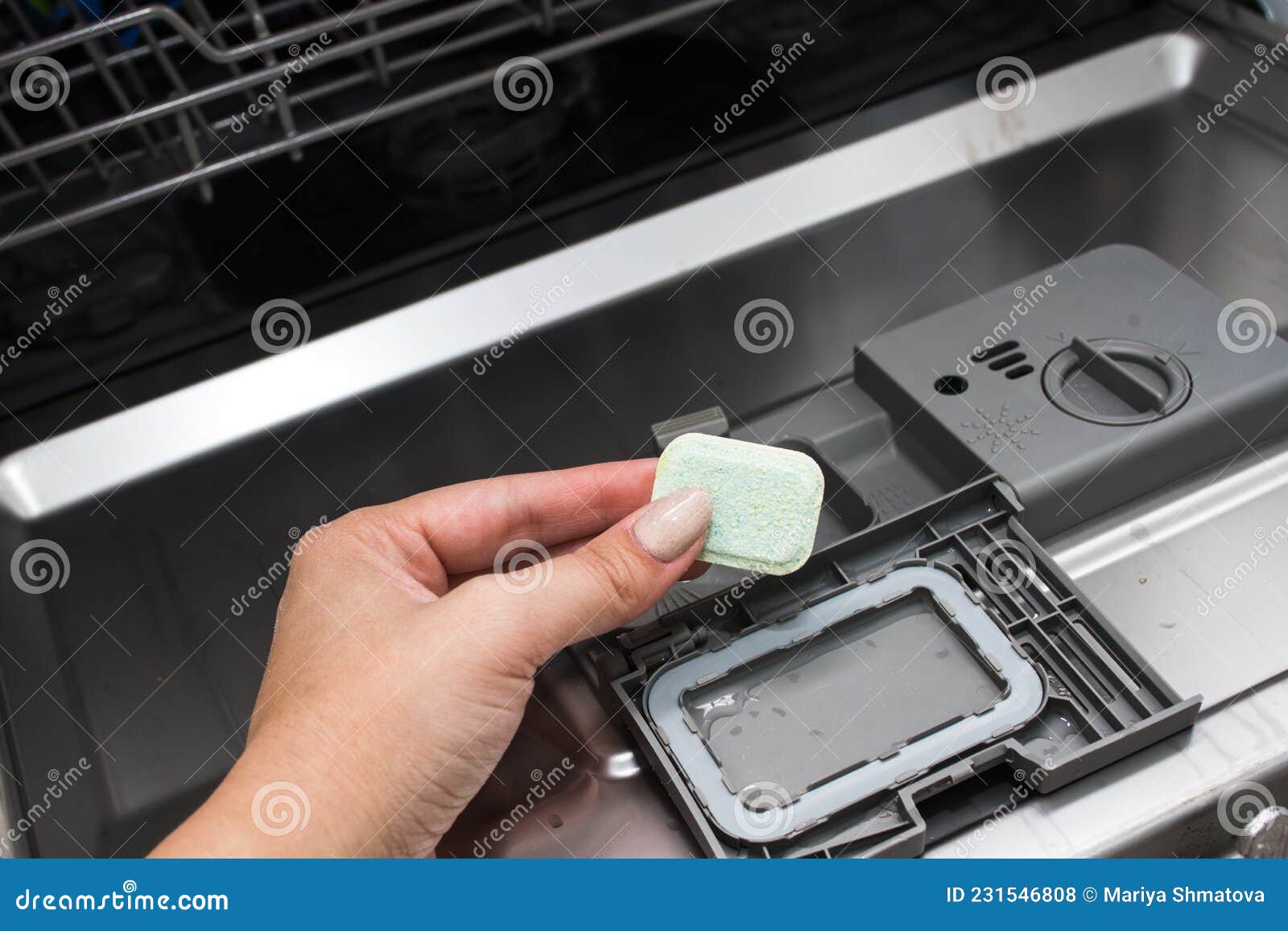 Dishwasher Tablet. Cleaning the Kitchen. Washing Dishes in the