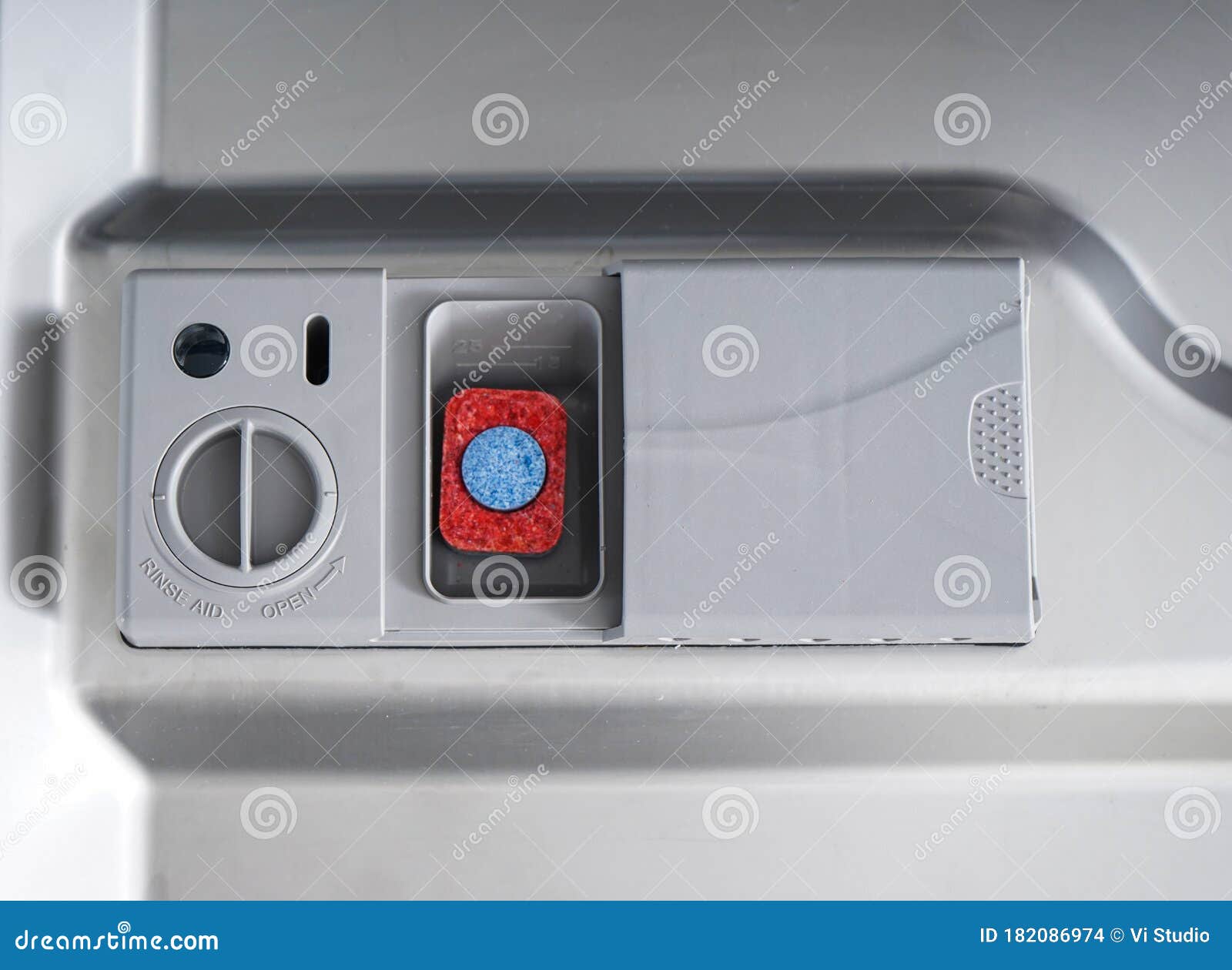 Dishwasher Tablet in a Plastic Dishwashing Container, Closeup Stock
