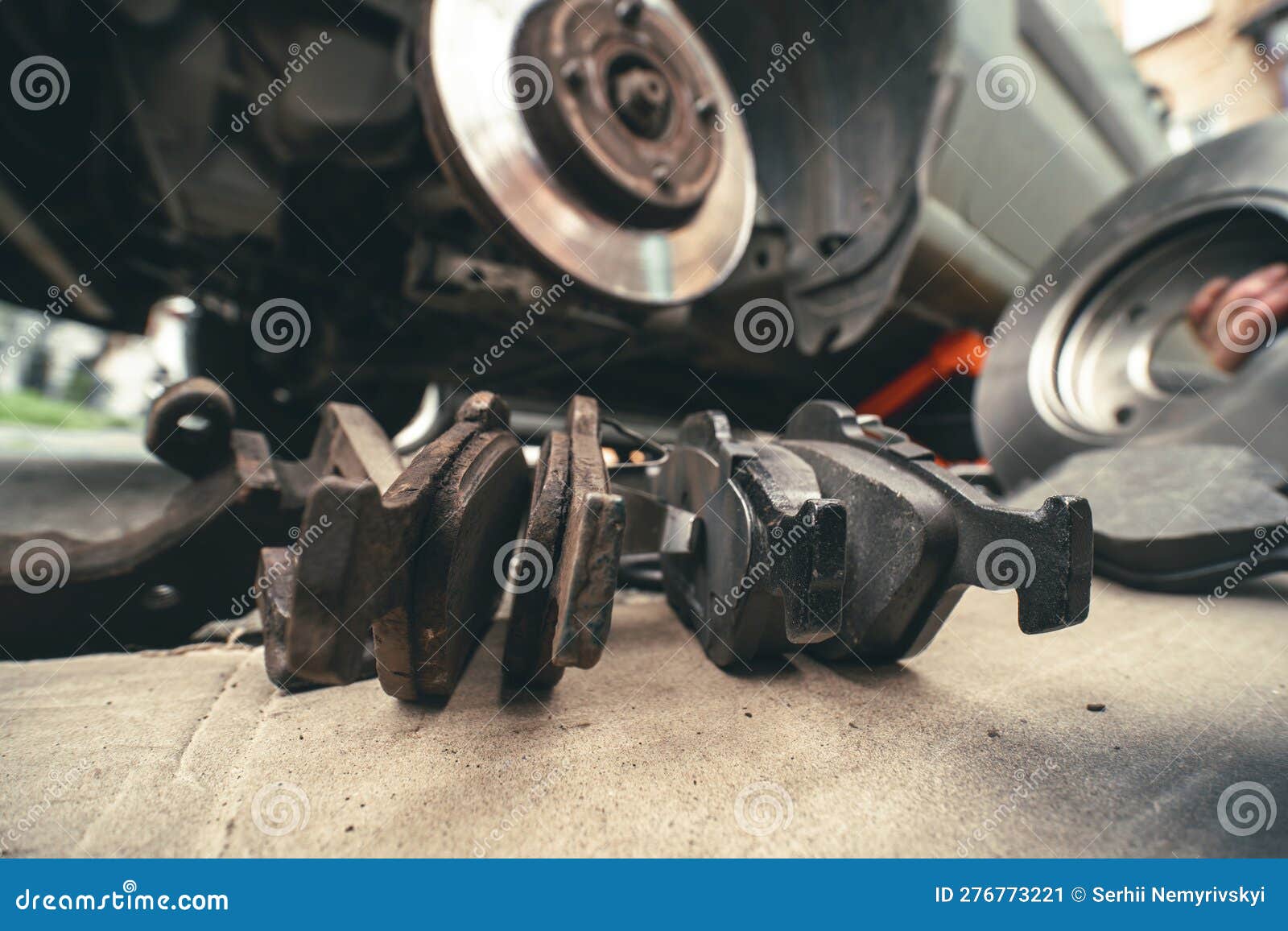 disk brake and car service concept - vehicle brake pad replacement service. copy space, do it yourself, myself. old and new pards