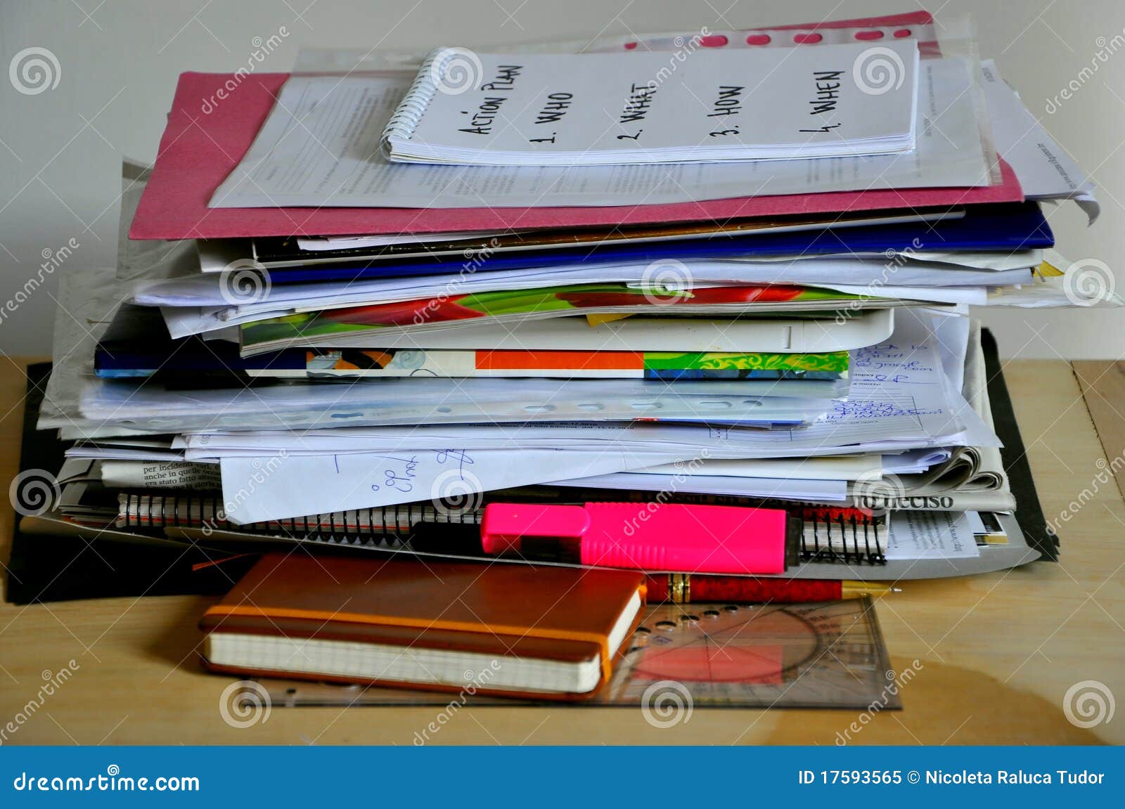 disordered papers, clutter on a desk