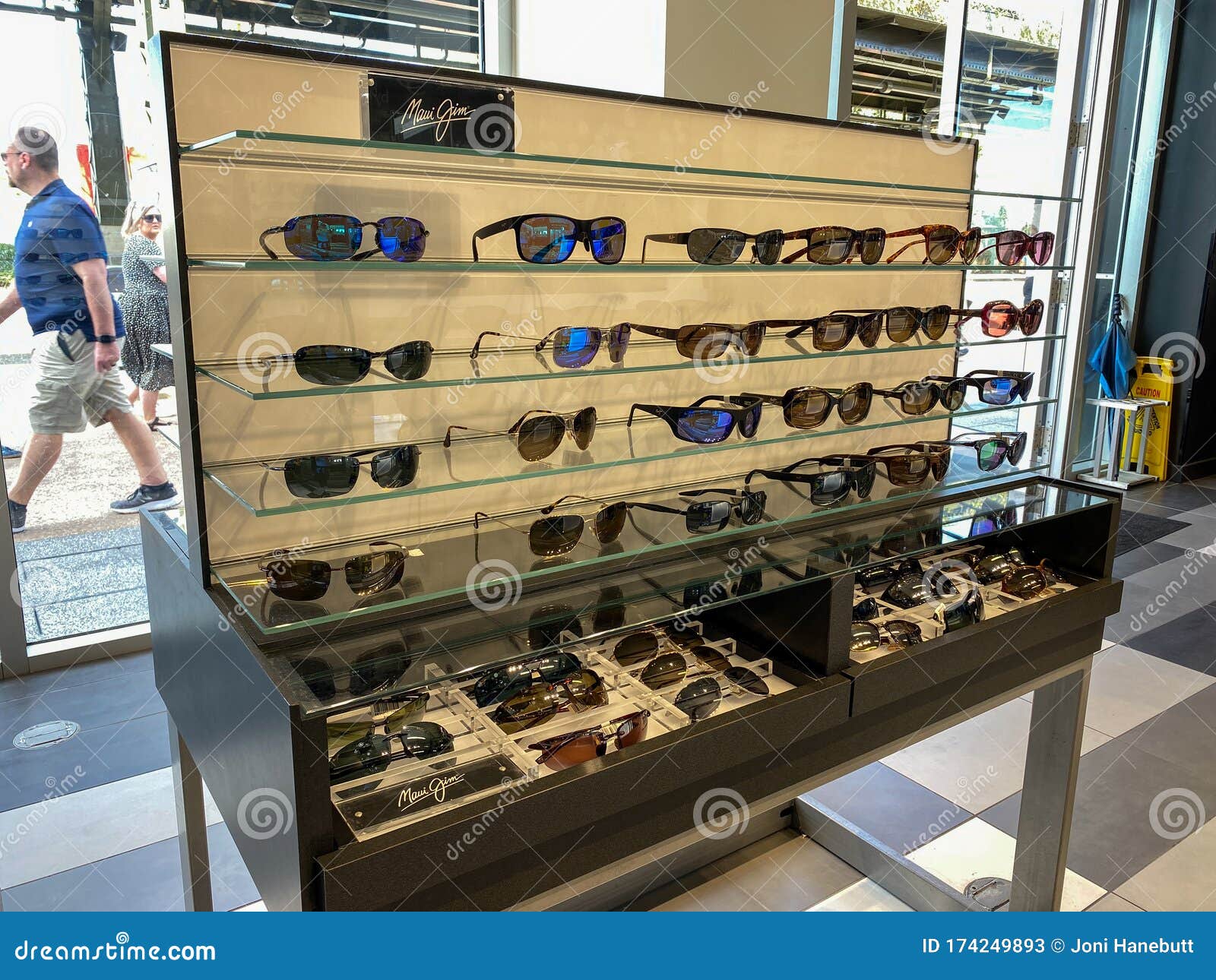 A Display of Maui Jim Sunglasses at Sunglass Hut Retail Store Editorial