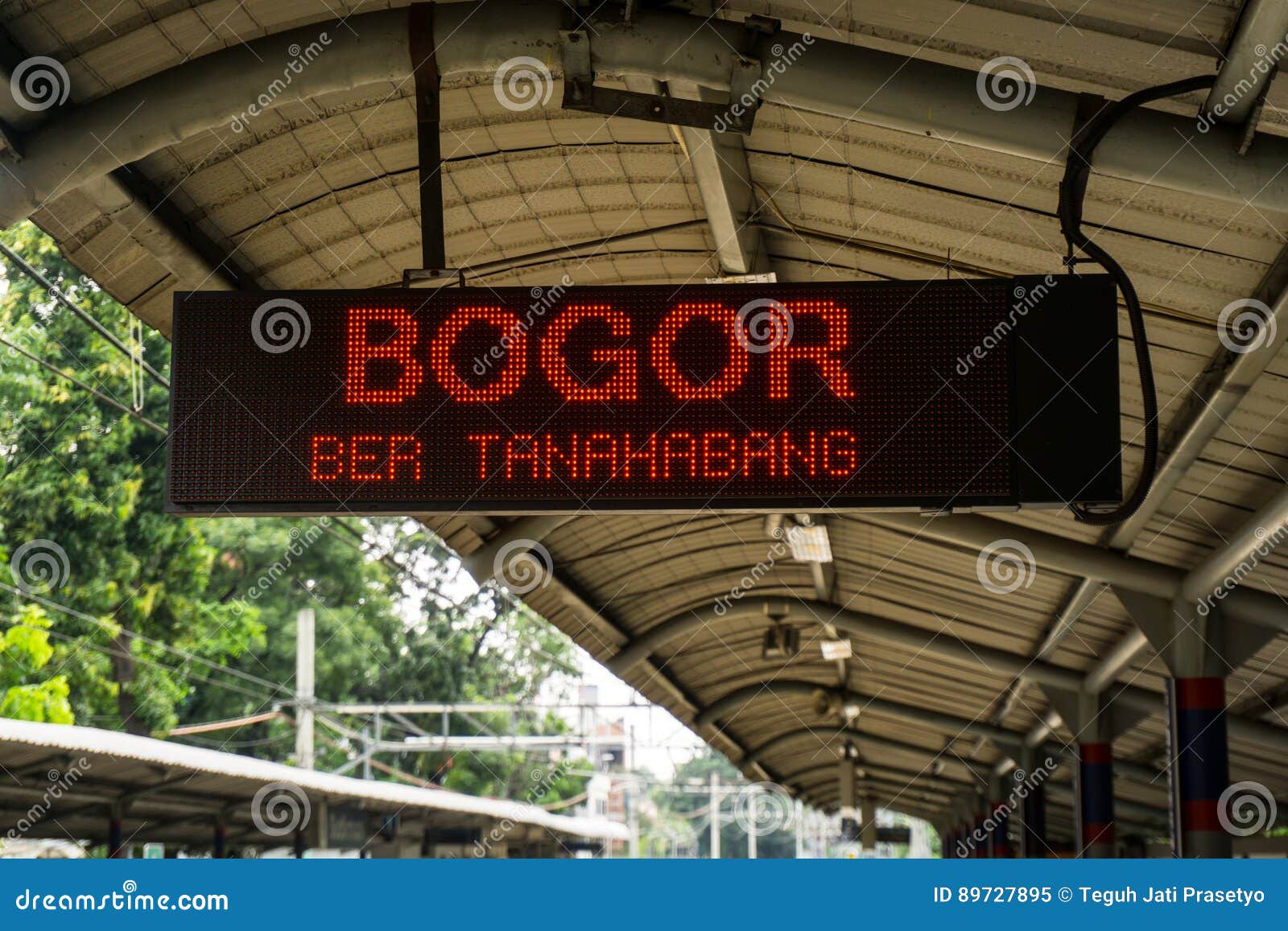 display monitor at train station showing train to bogor will entering station soon photo taken in jakart indonesia