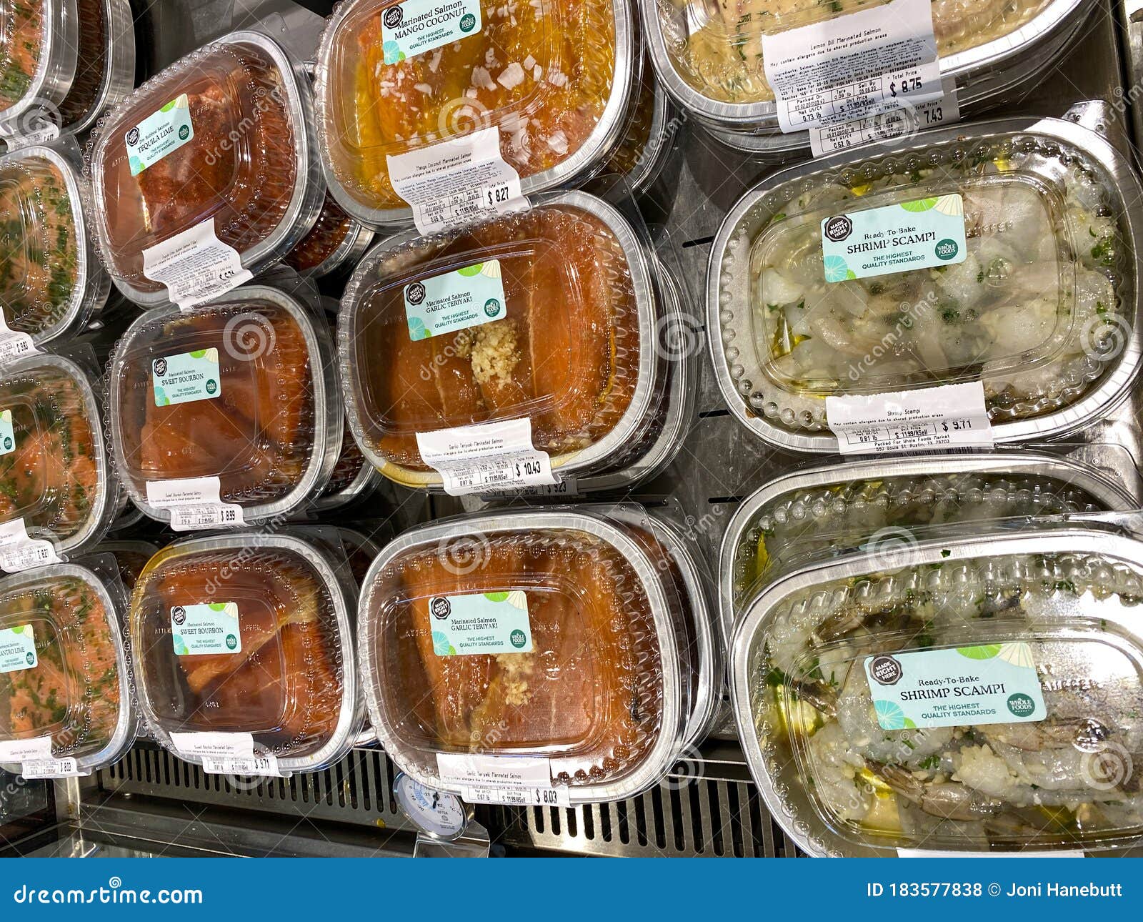 A Display of Ready To Bake Seafood Dinners at a Whole Foods Market