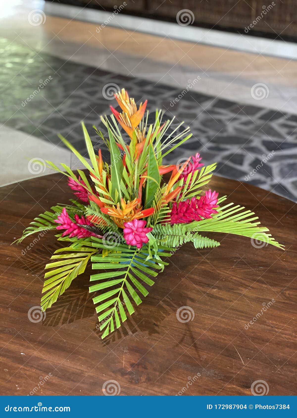 Display Of Tropical Flowers And Leaves On A Hotel Lobby Table Stock Photo Image Of Tropical Pink 172987904