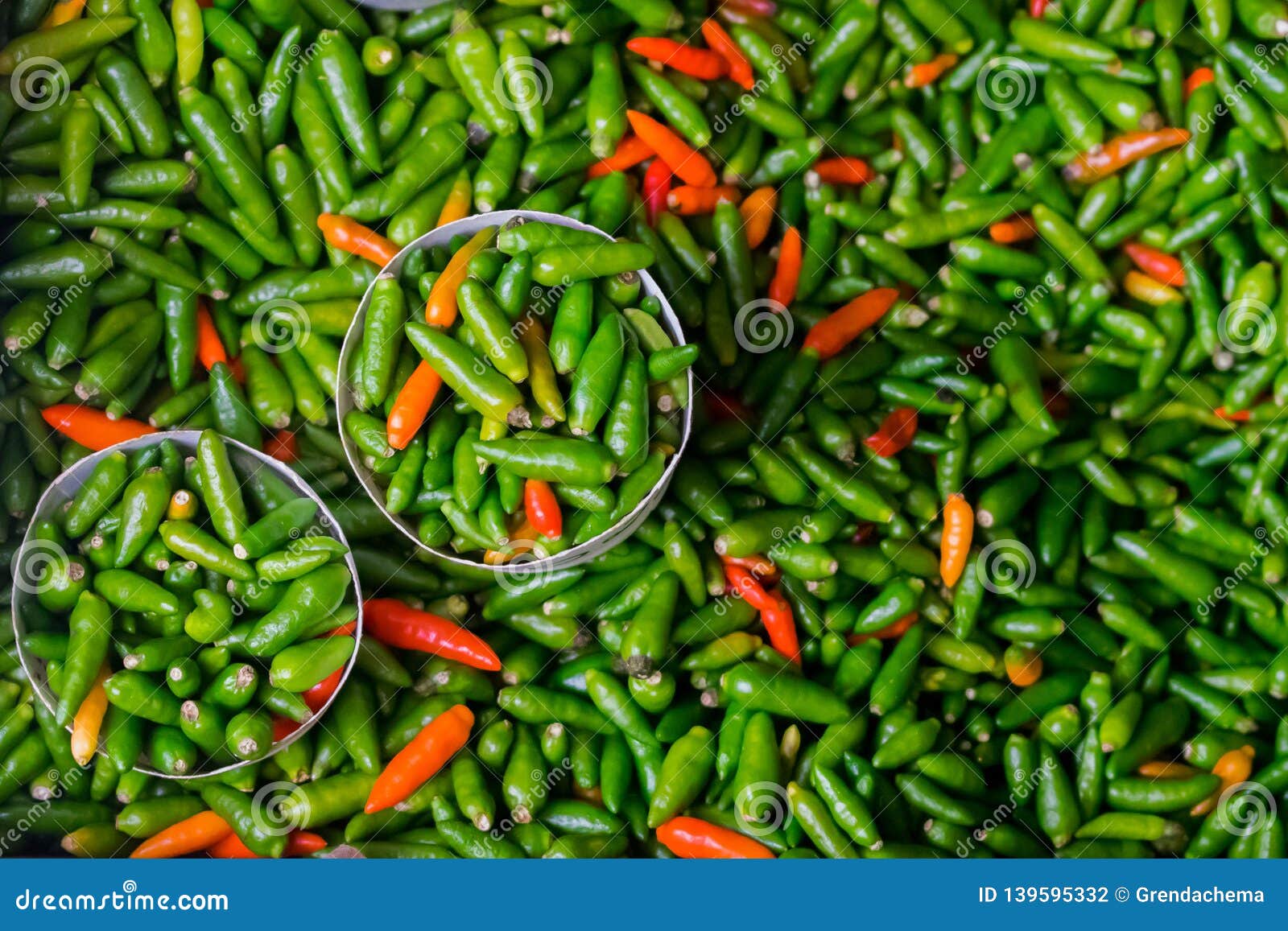 displayed red and green small chilli pepper