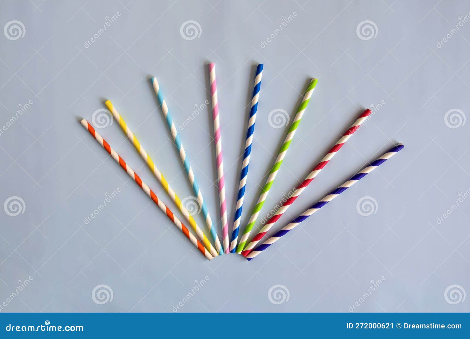 https://thumbs.dreamstime.com/z/disposable-colorful-striped-paper-cocktail-sticks-party-blue-background-eco-friendly-drinking-straws-choice-reduce-272000621.jpg