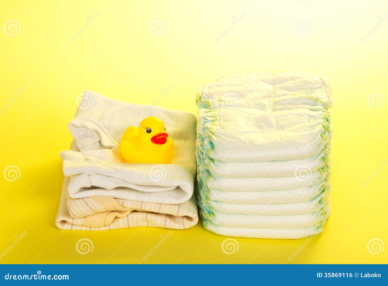 Disposable Diapers, Clothes and Rubber Duckling Stock Photo Image of