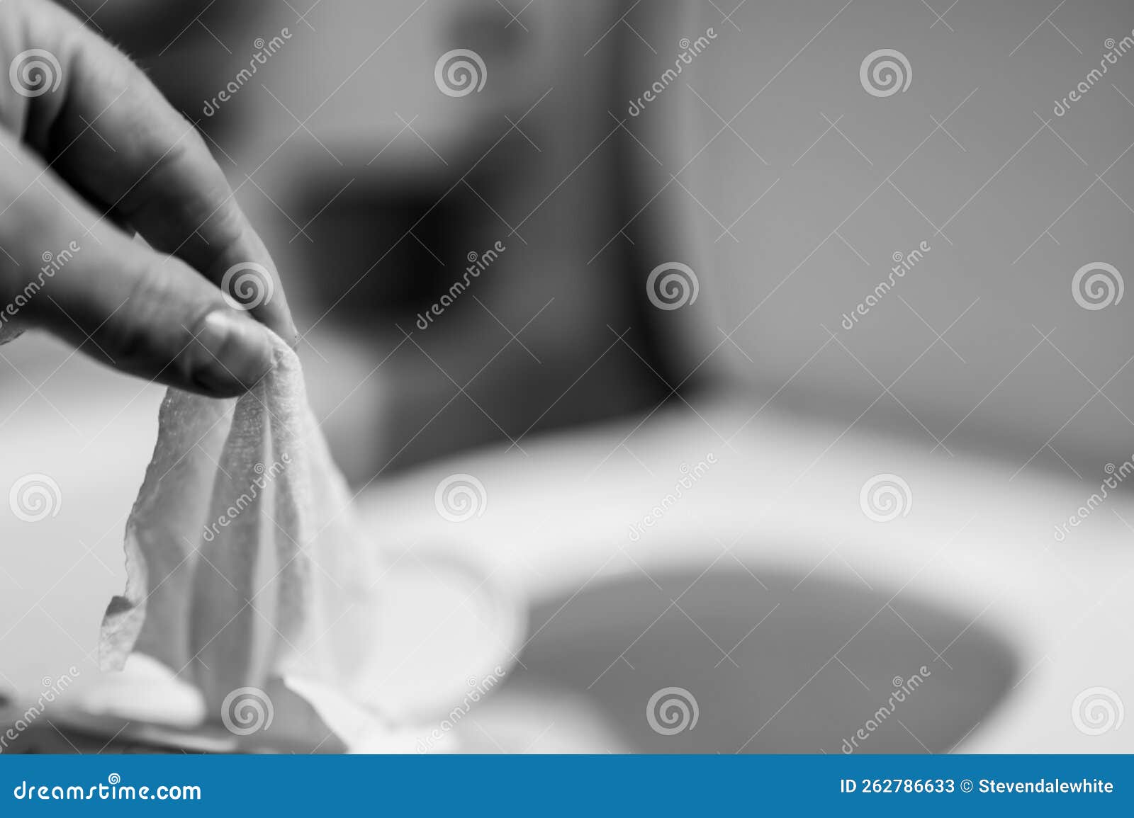 Disposable Wipes Being Flushed Down a Toilet Where they Can Cause