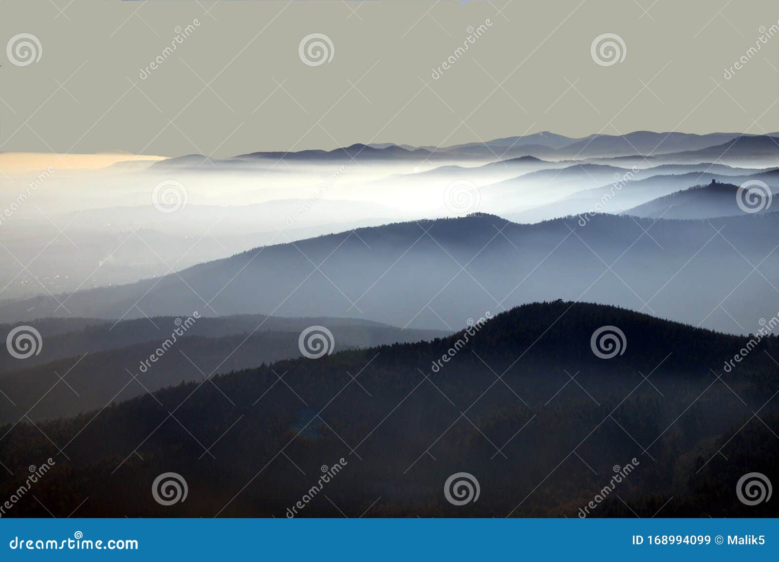 distant mountain silhouette with clear sky and soft light