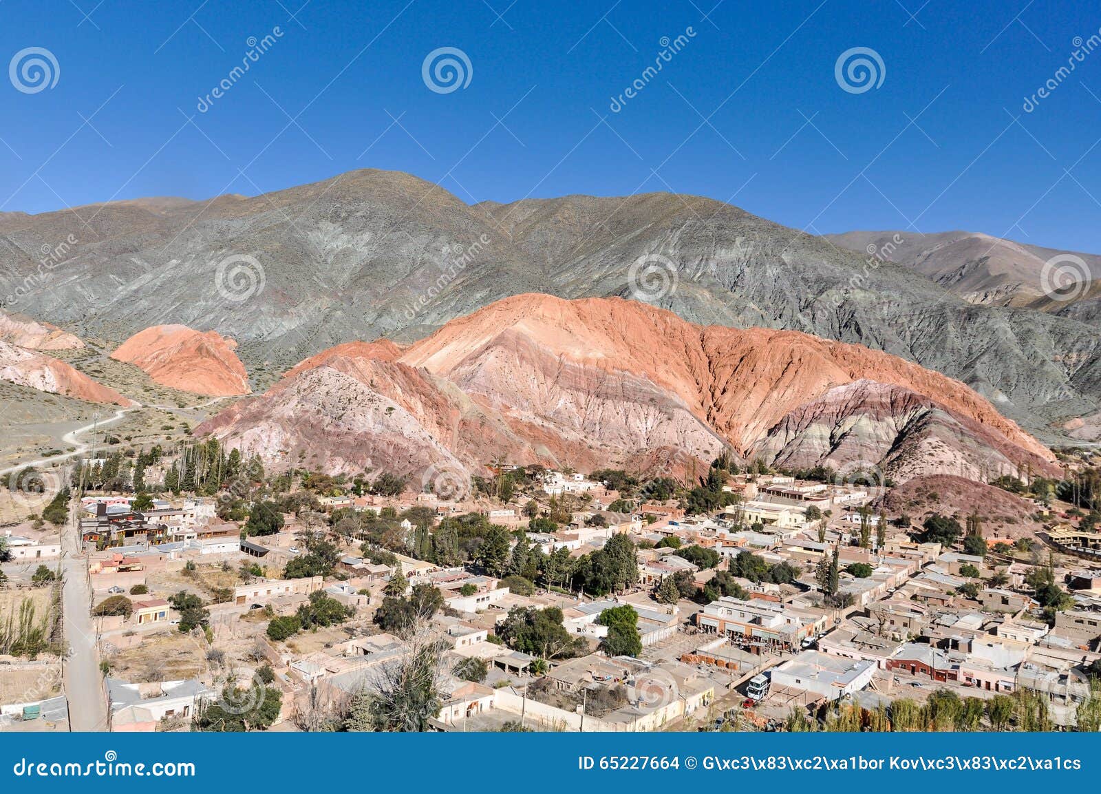 distant view of cerro de los siete colores, purnamarca, argentina