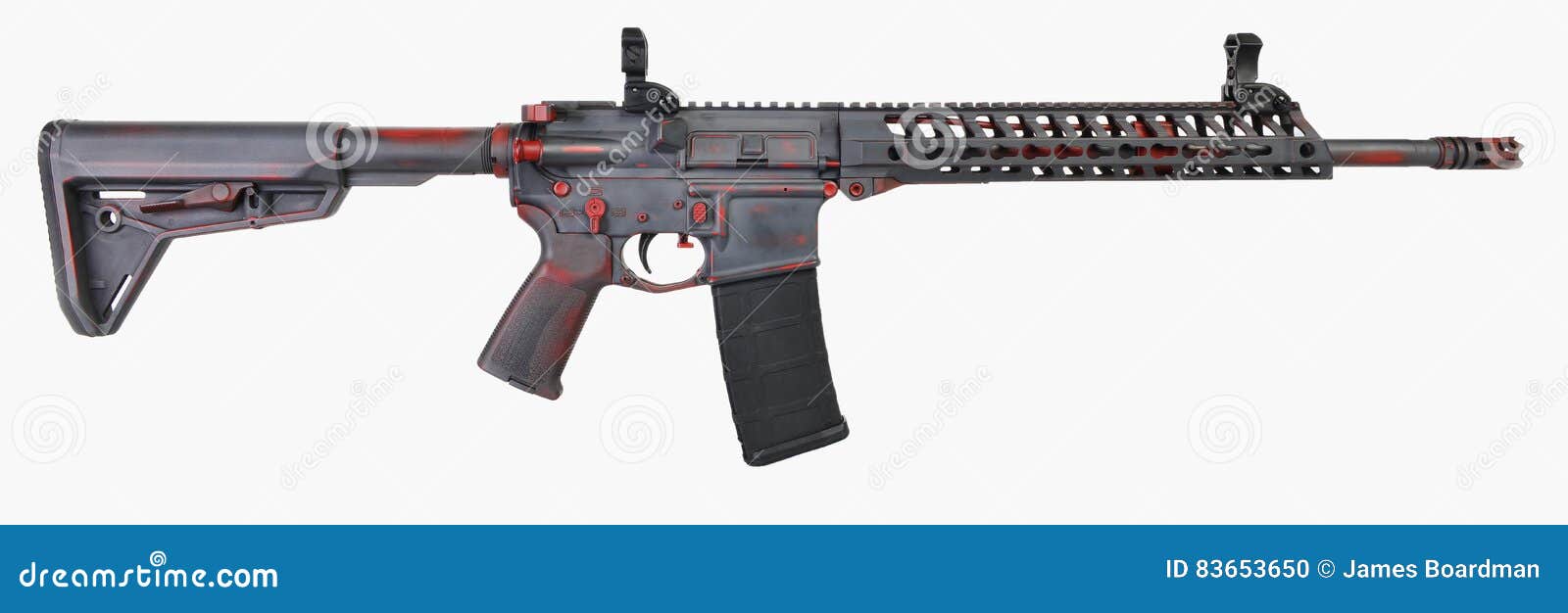 distressed ar15 grey with red base and controls with a 30rd mag