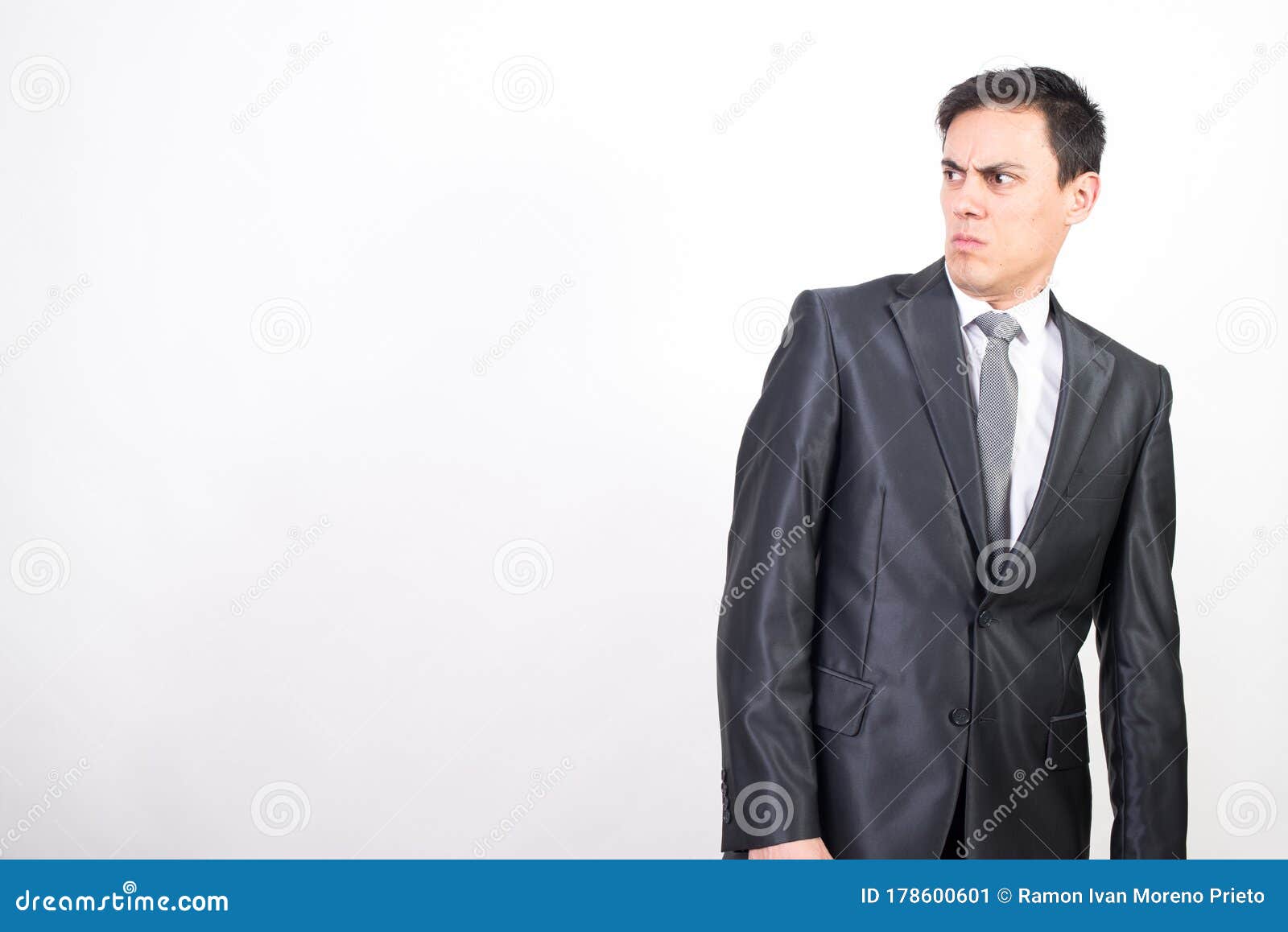 Distrustful man in suit stock image. Image of single - 178600601