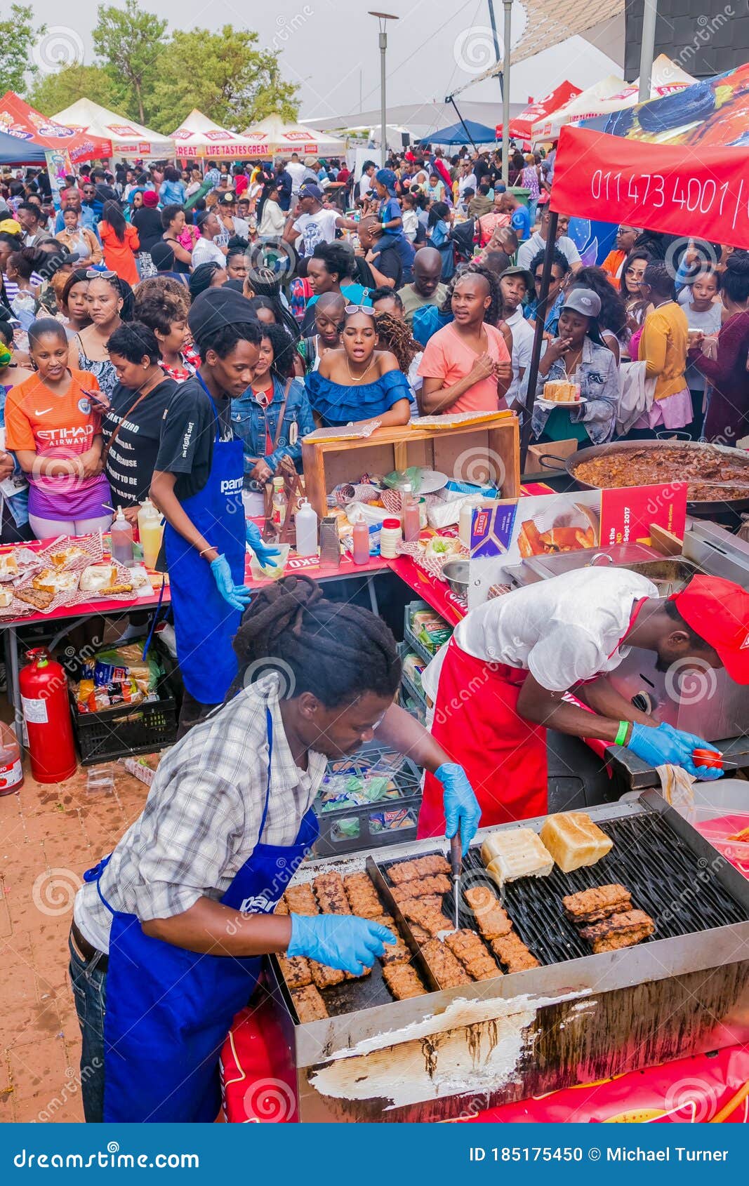 Diverse African People at a Bread Based Street Food Outdoor Festival