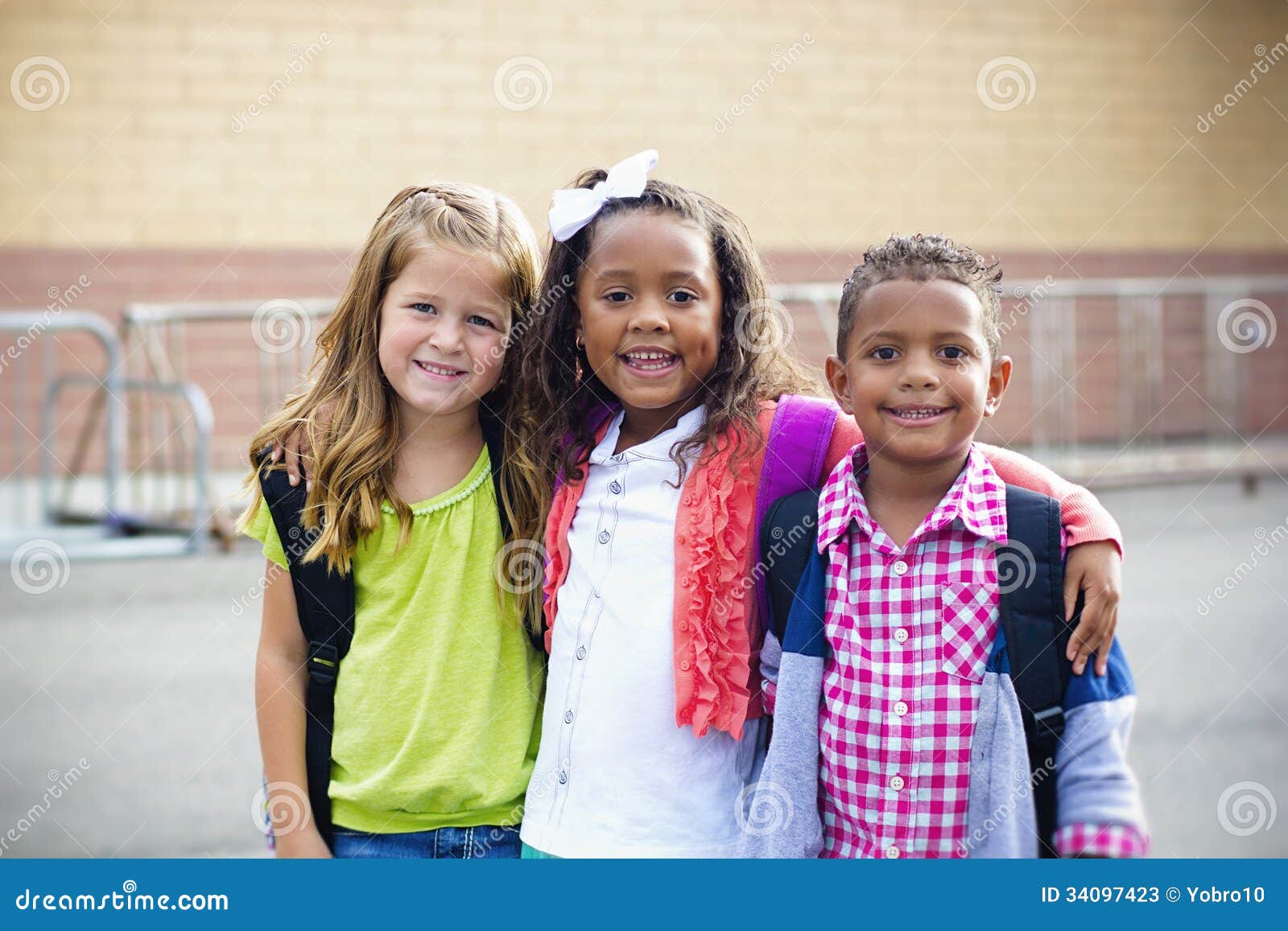 diverse children going to ary school