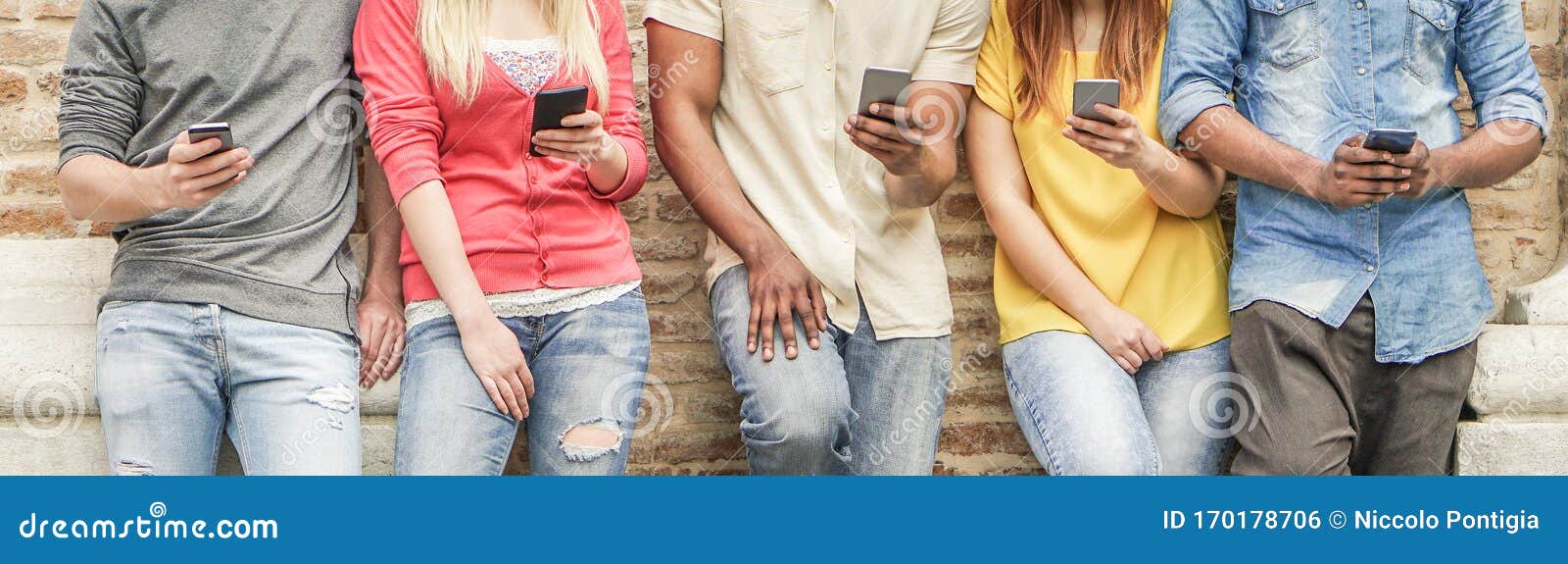 diverse culture students watching smart mobile phones in university break - young people addiction to new technology trends -