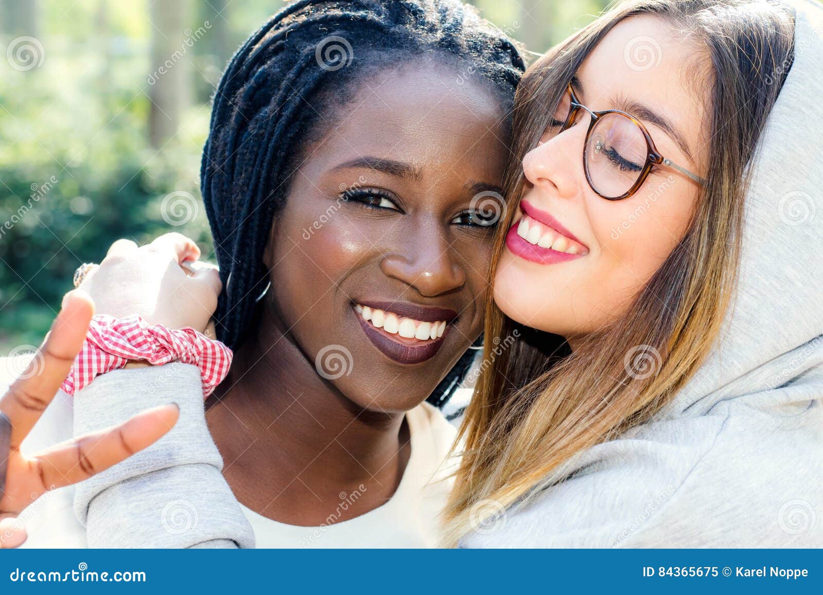 diverse female couple showing affection.