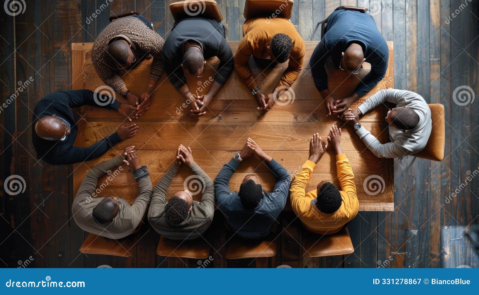 diverse group of business professionals having a meeting around a conference table, discussing ideas and strategies