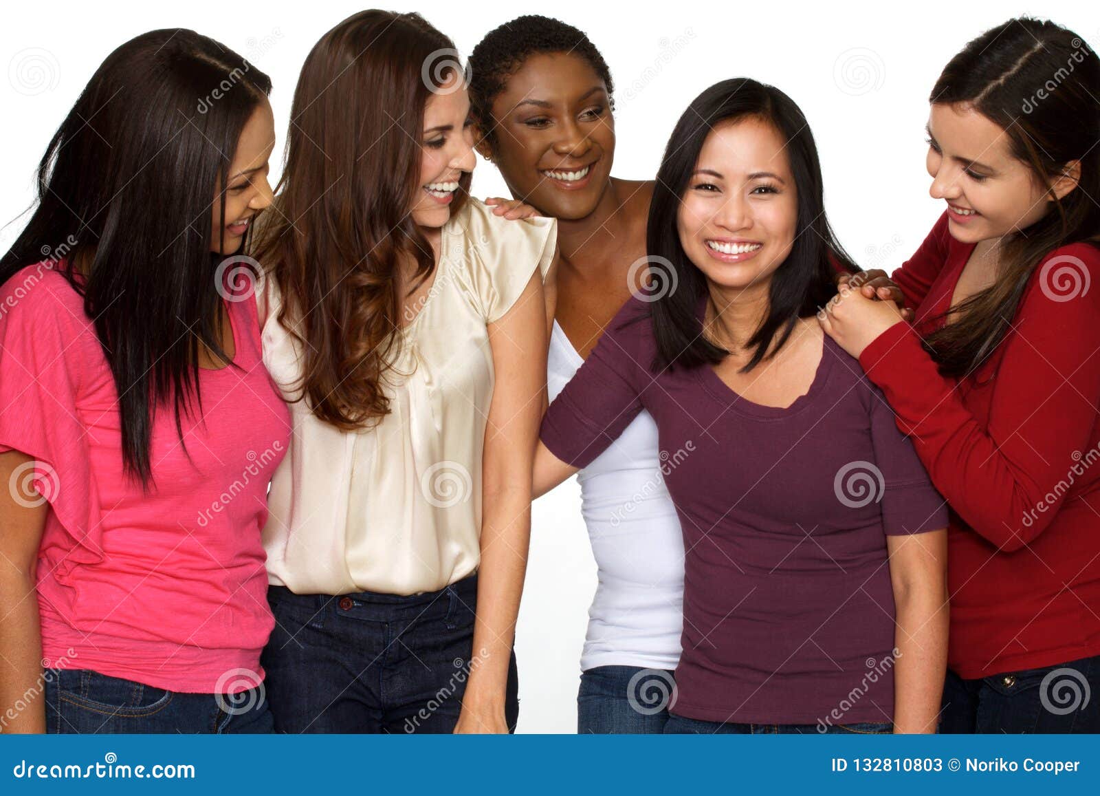 diverse group of women laughing and talking.