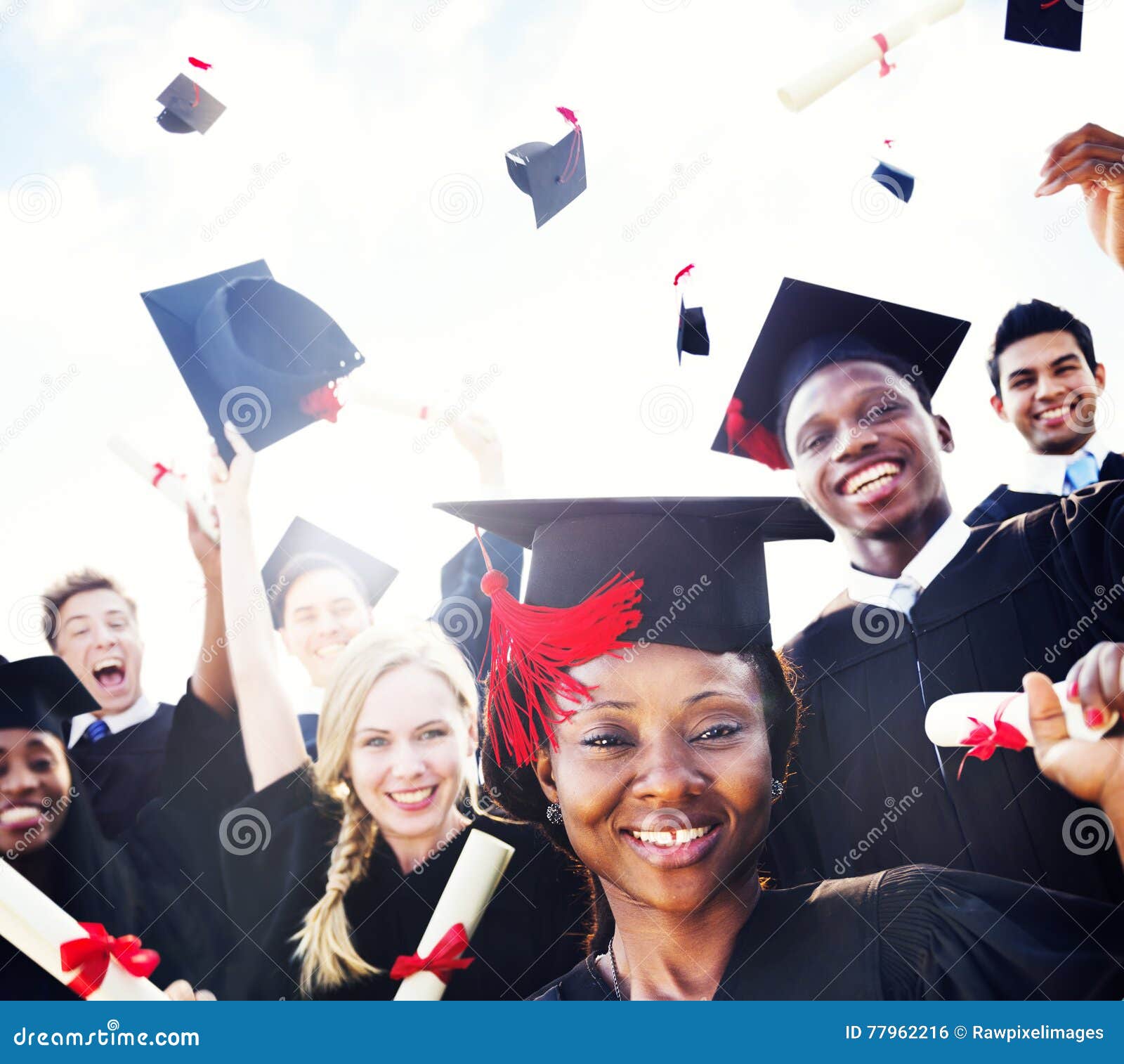 diverse international students celebrating graduation concept