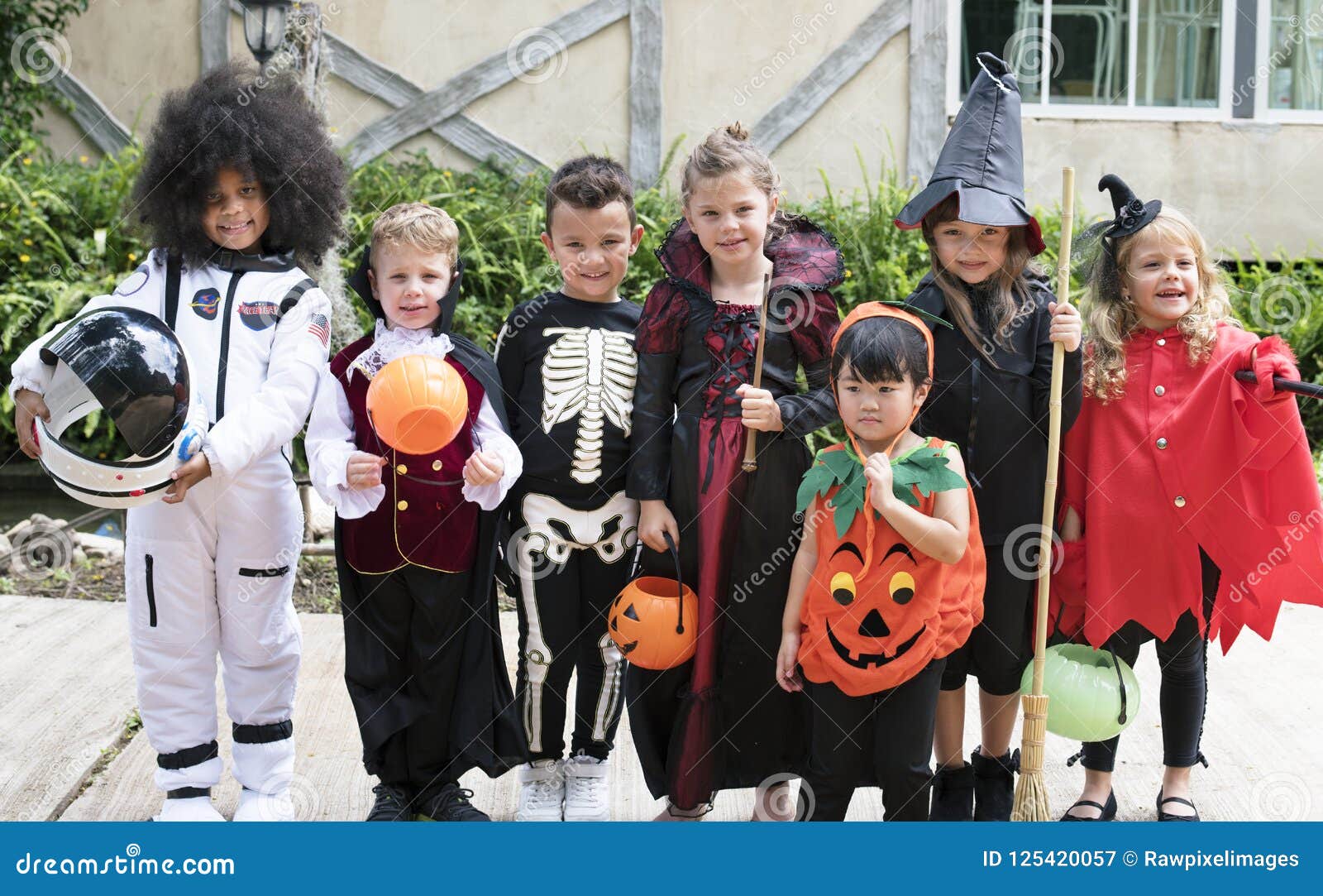 diverse kids in halloween costumes