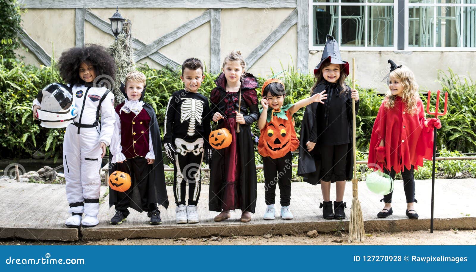 diverse kids in halloween costumes