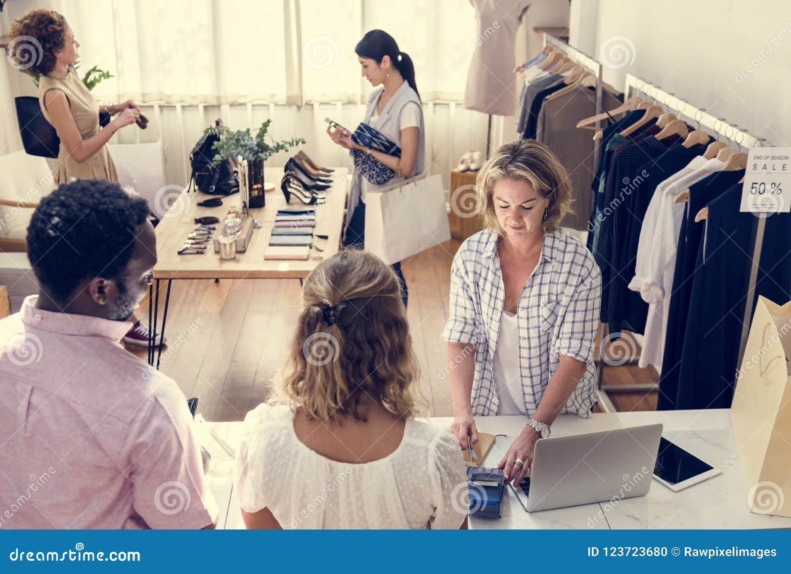 Diverse People Checking Out Clothes Stock Photo - Image of workshop ...