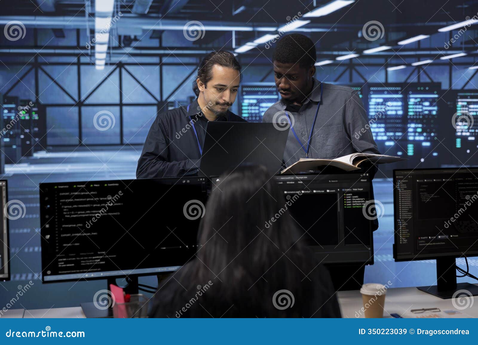 diverse team of engineers in data center looking for firewall misconfigurations