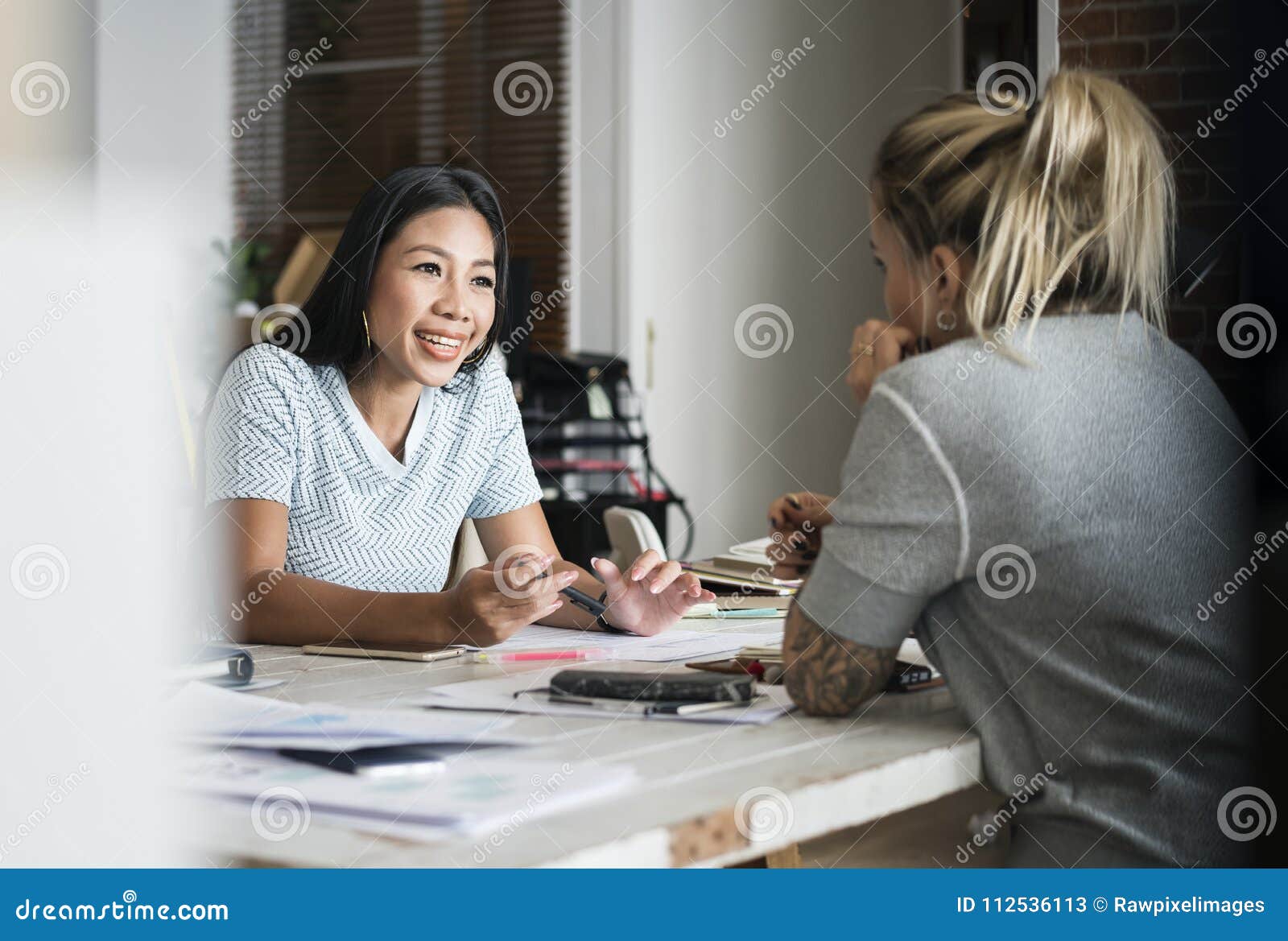 diverse women friends talking together