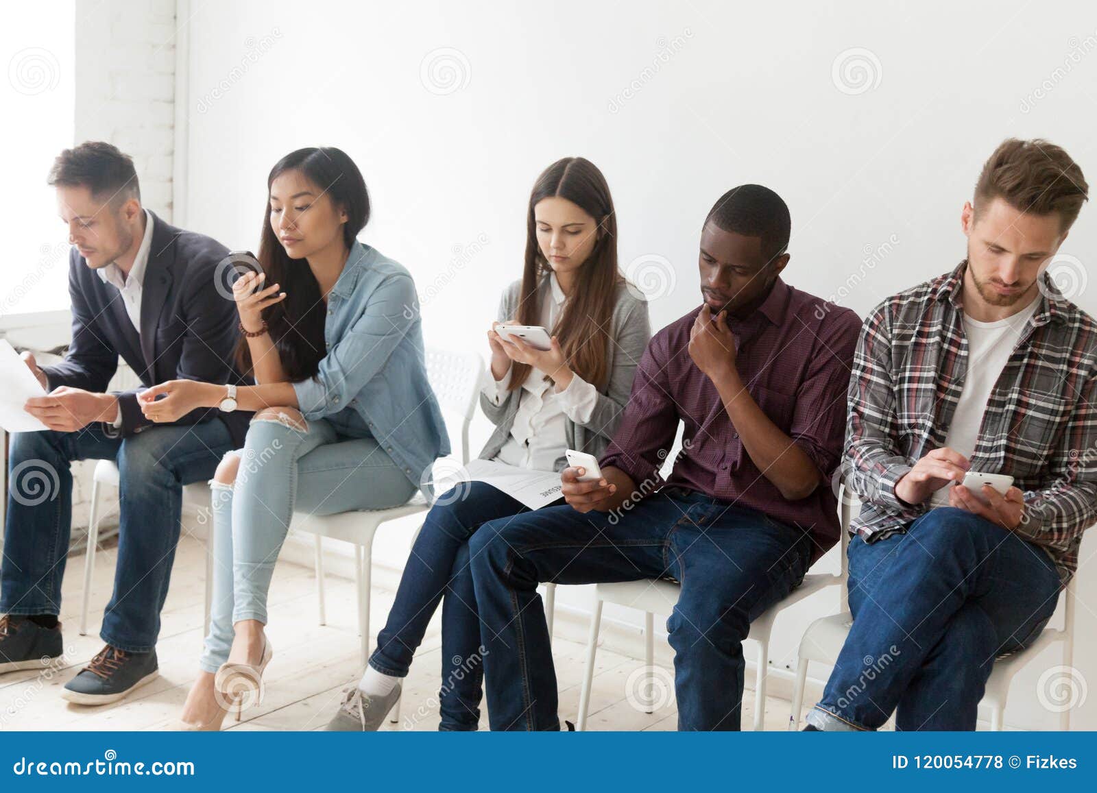Diverse Work Candidates Holding Devices Preparing for Job Interv Stock