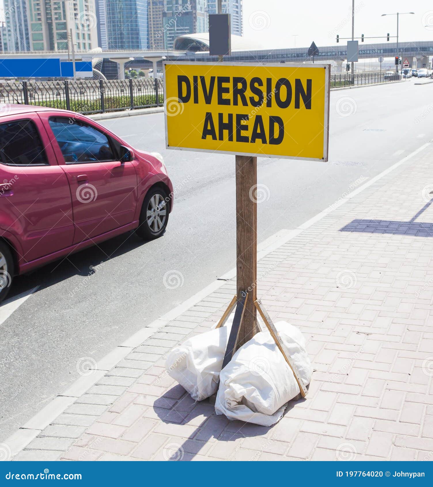 diversion ahead sign in traffic.