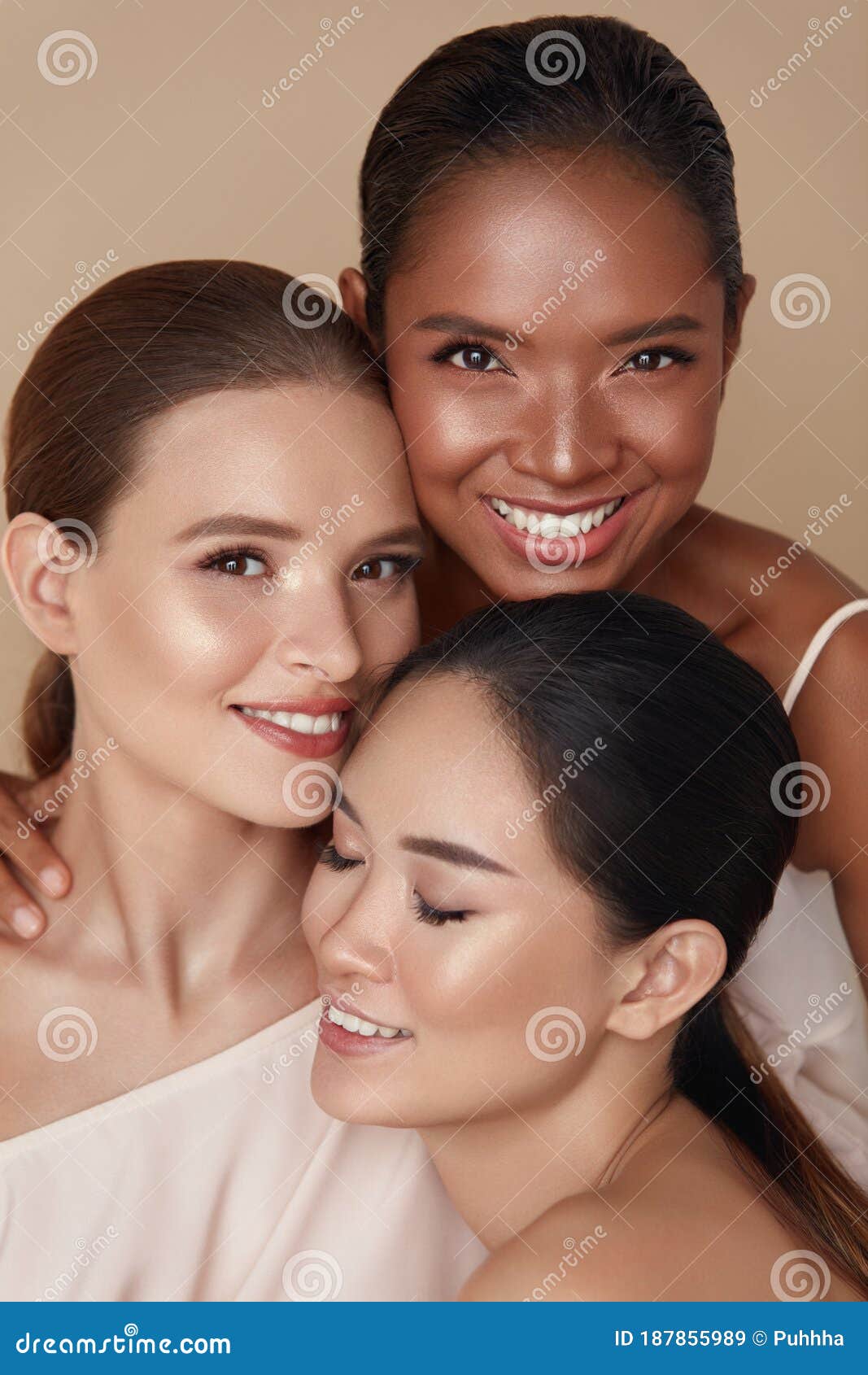 diversity. beauty portrait of women. multi-ethnic models with natural makeup and perfect skin against beige background.