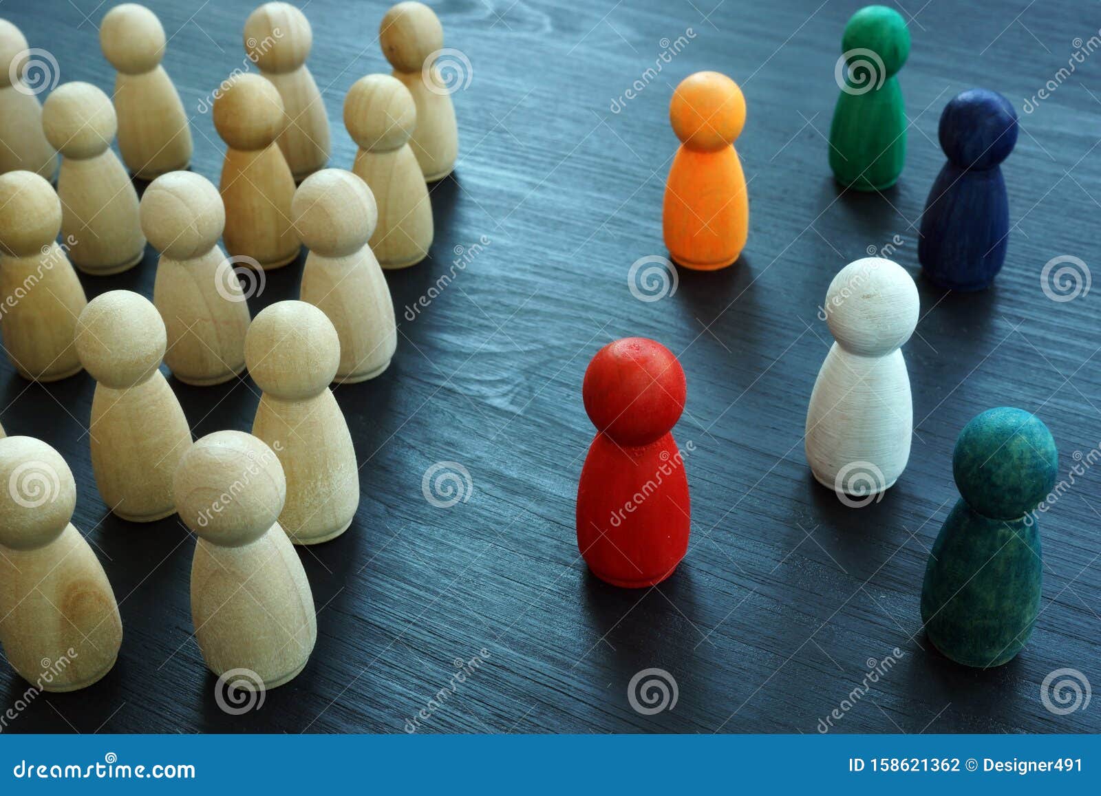 diversity and inclusion. wooden and colored figurines
