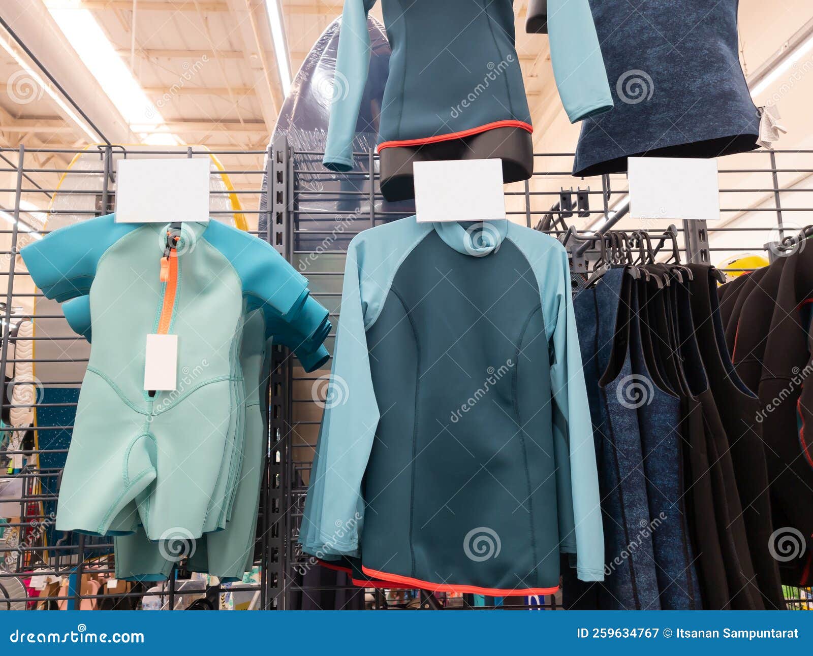 Diving suits in store stock image. Image of customer 259634767