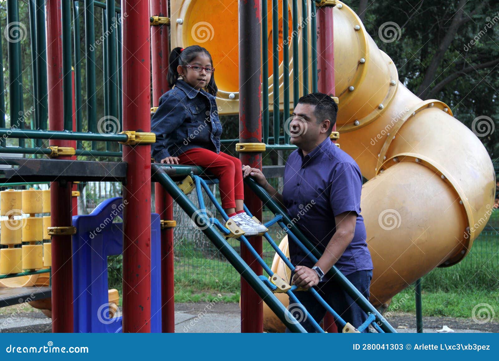 divorced single dad and 4-year-old daughter latino brunettes play on outdoor park playground spend quality time together tech-free