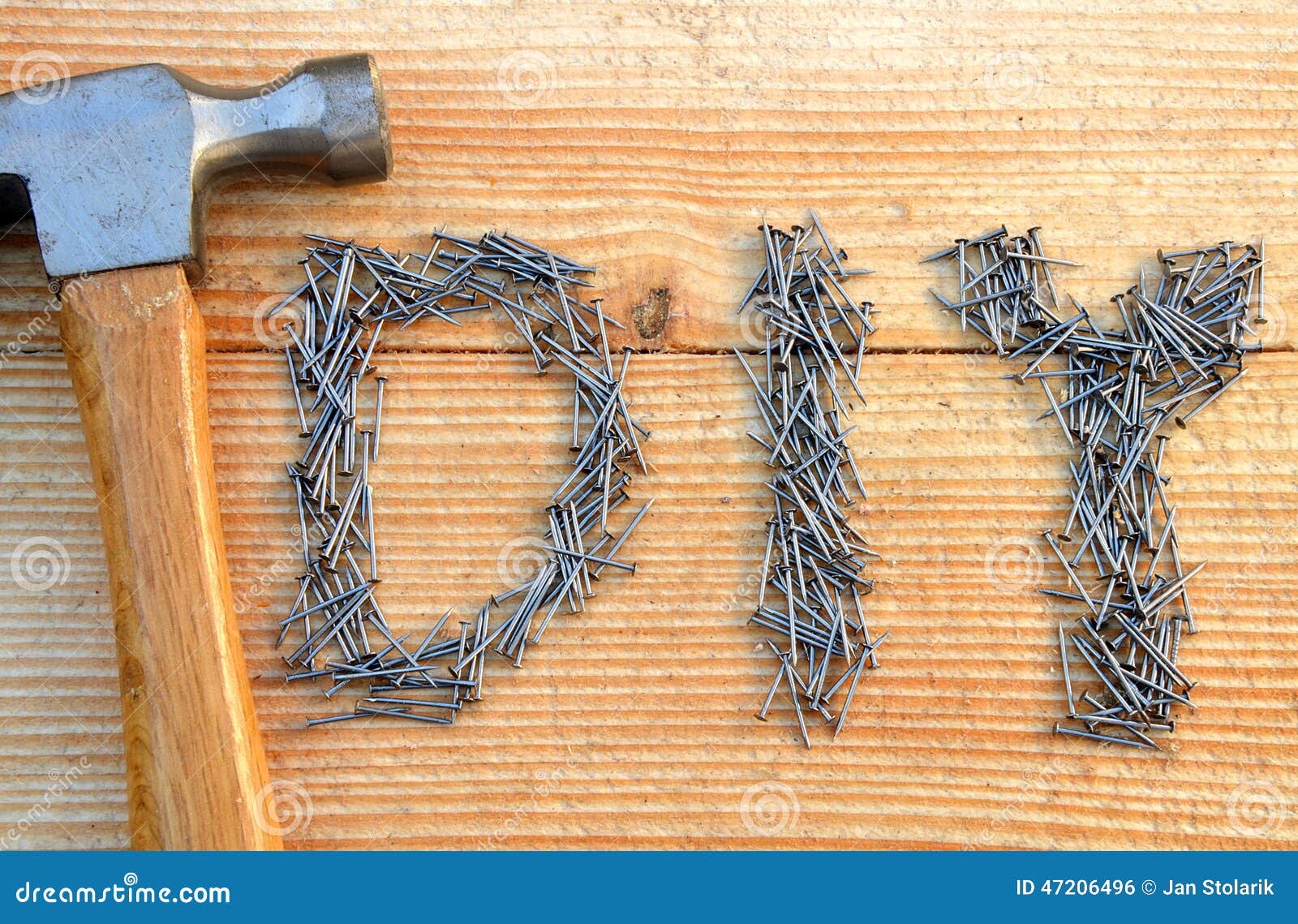 DIY do It Yourself Text From Small Nails And Hammer 