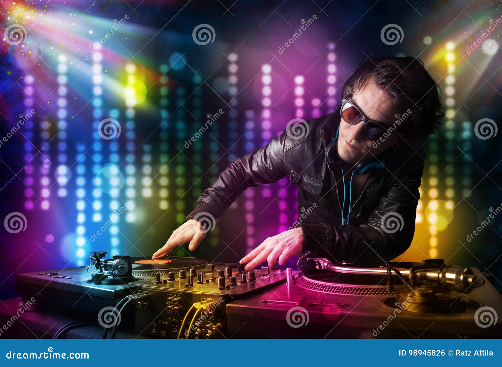 Dj Playing Songs in a Disco with Light Show Stock Photo Image of