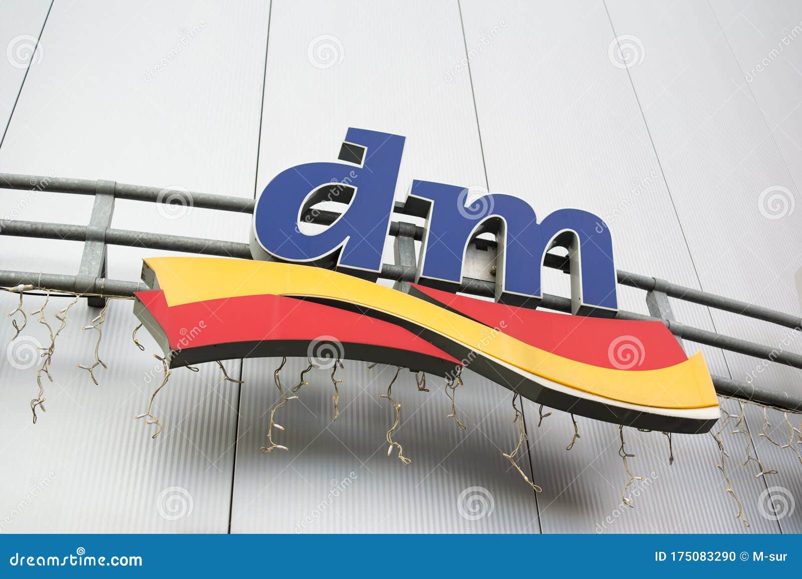 DM - Brand Logo of Company of Drugstores, Stores, Shops Editorial Image ...