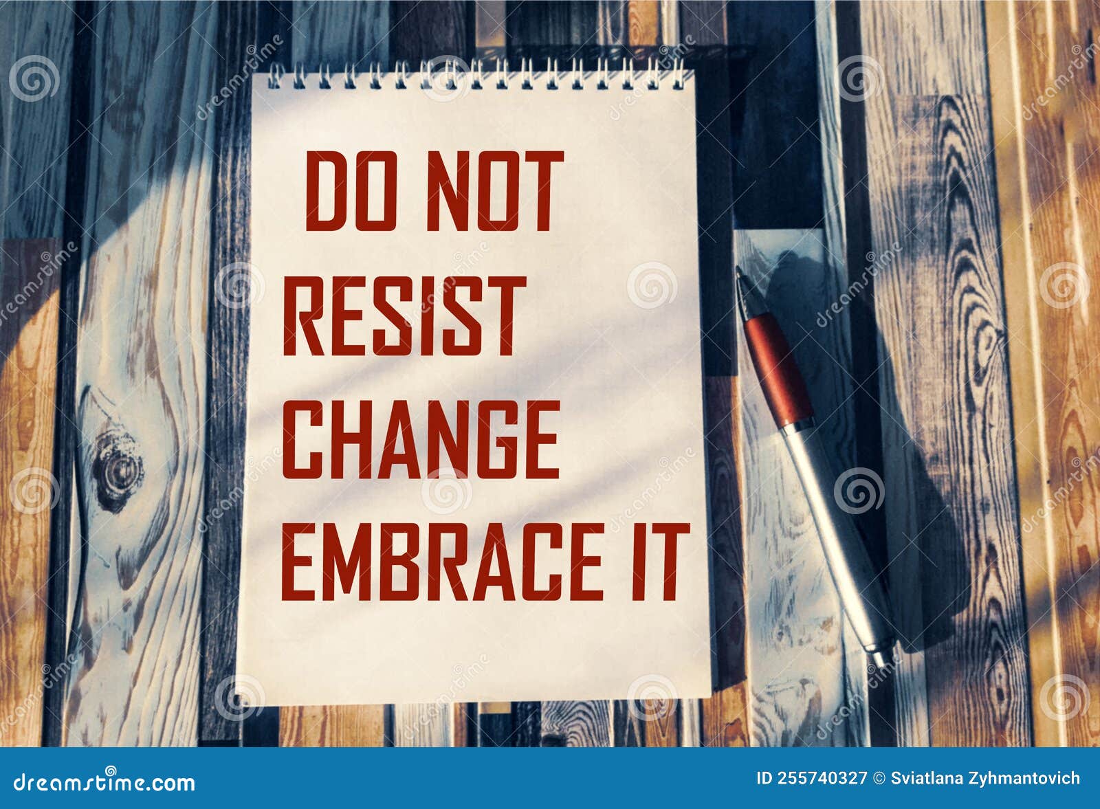Do Not Resist Change, Embrace it - Motivational Phrase on Notepad with ...