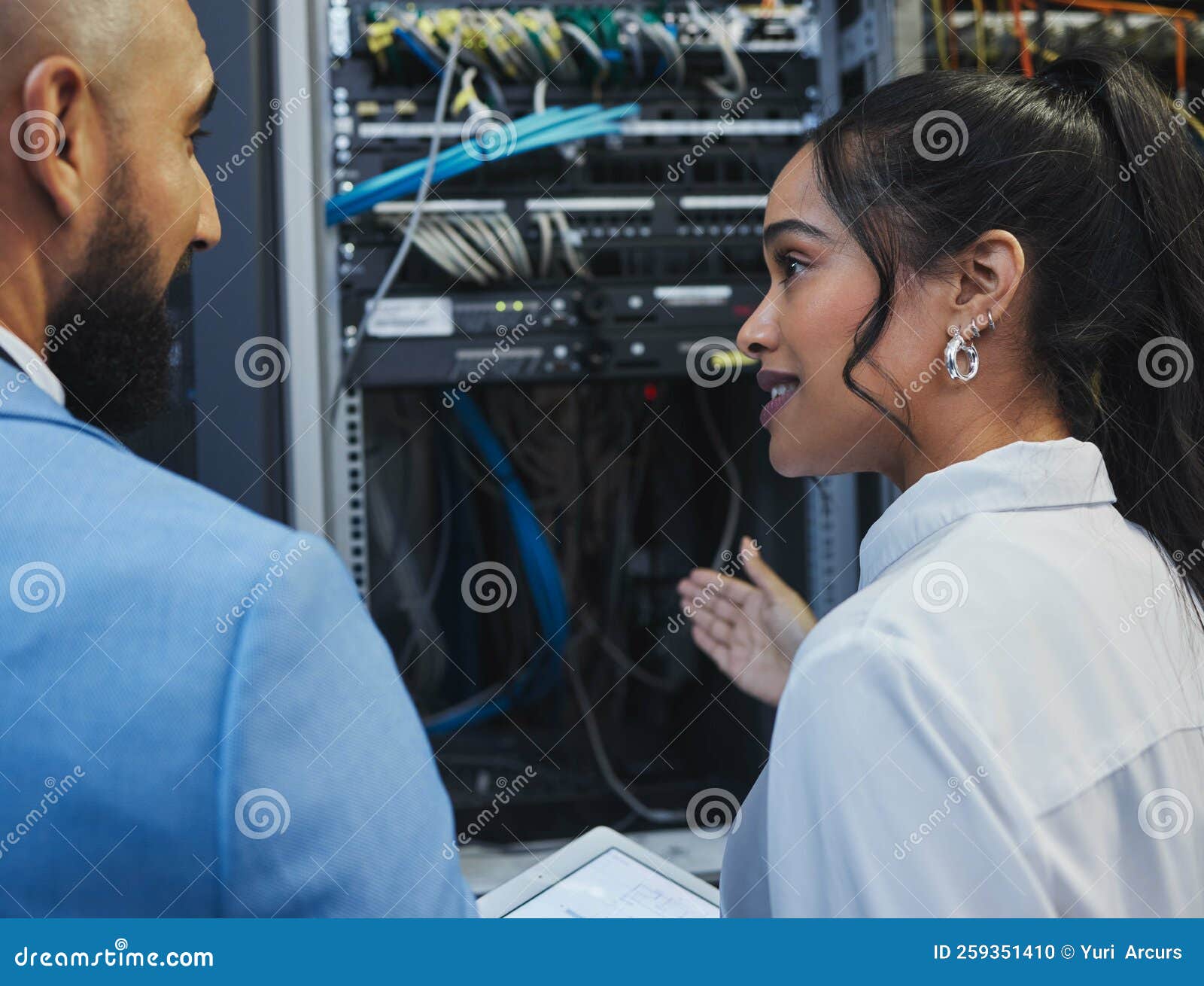 Do we Understand Each Other. Two Workers Inspecting the Electronic