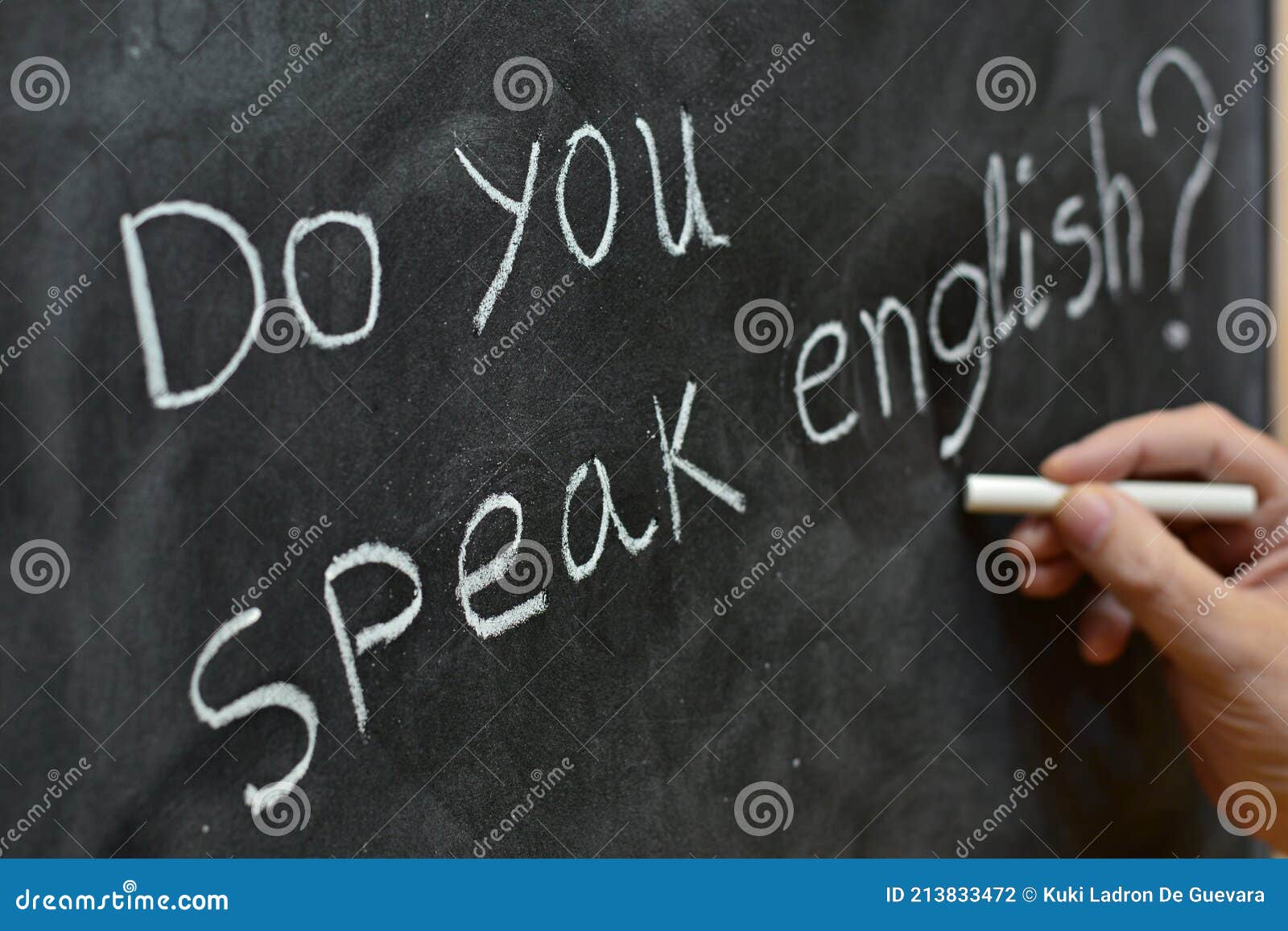 do you speak english, written on a blackboard