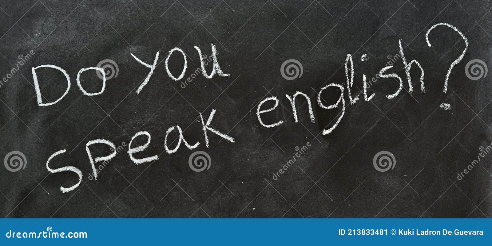 do you speak english, written on a blackboard
