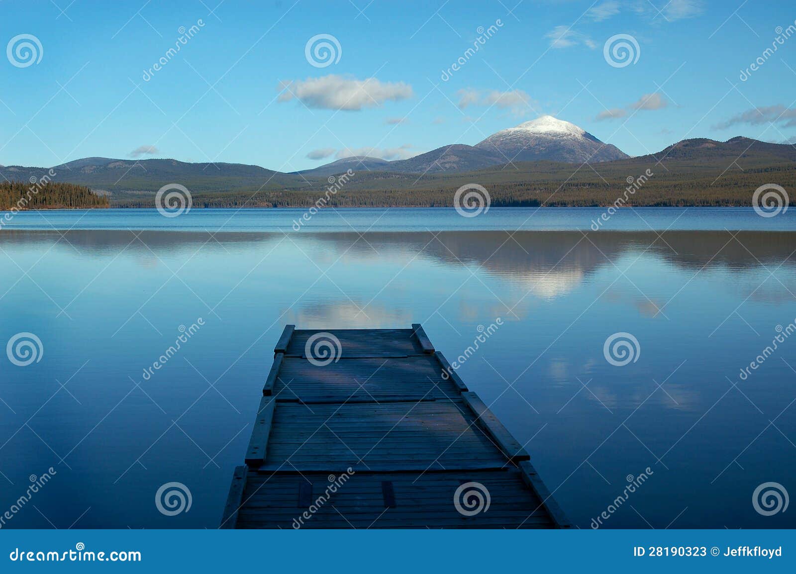 Dock on Calm Yukon Lake stock image. Image of reflection 28190323