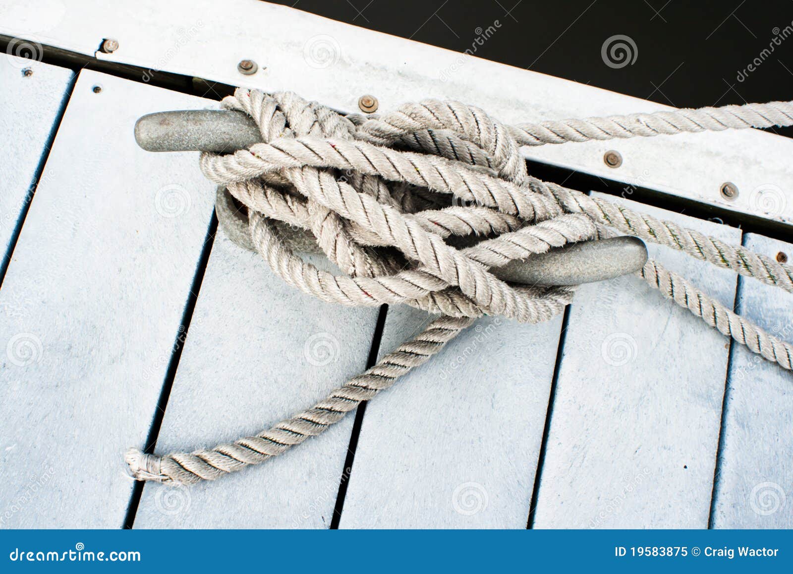 Dock cleat and rope stock image. Image of neatly, cleat 19583875