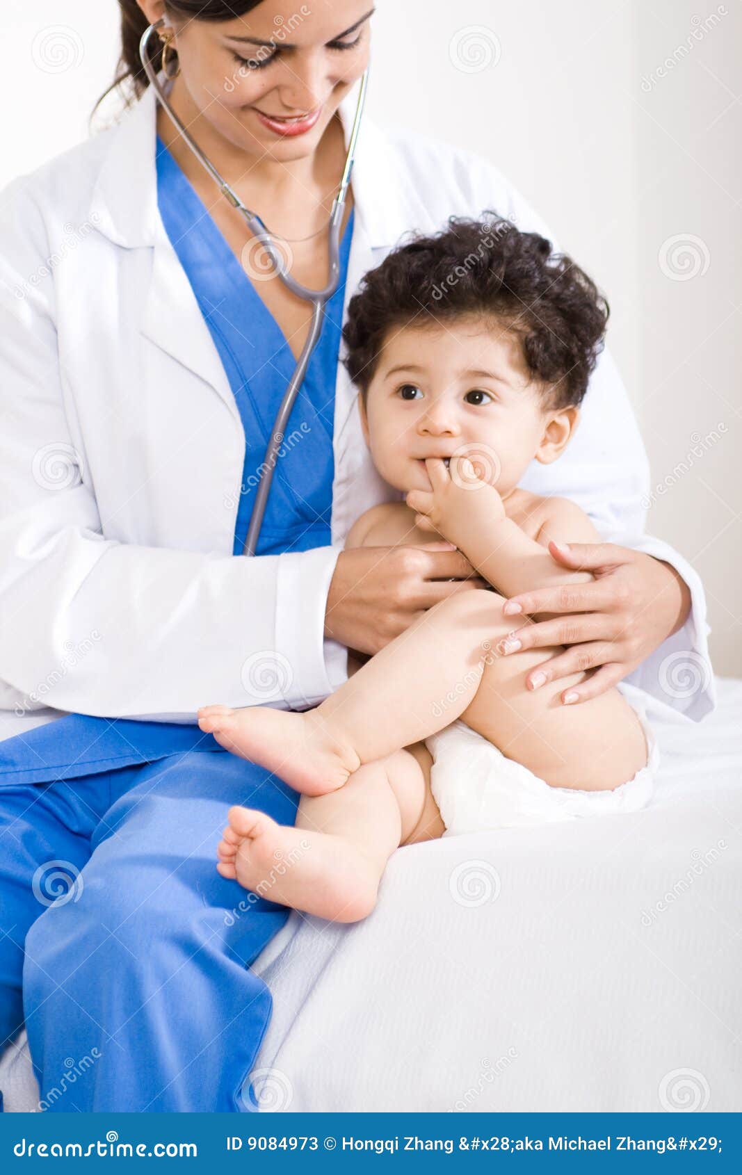 Doctor and baby stock image. Image of examining, children 9084973