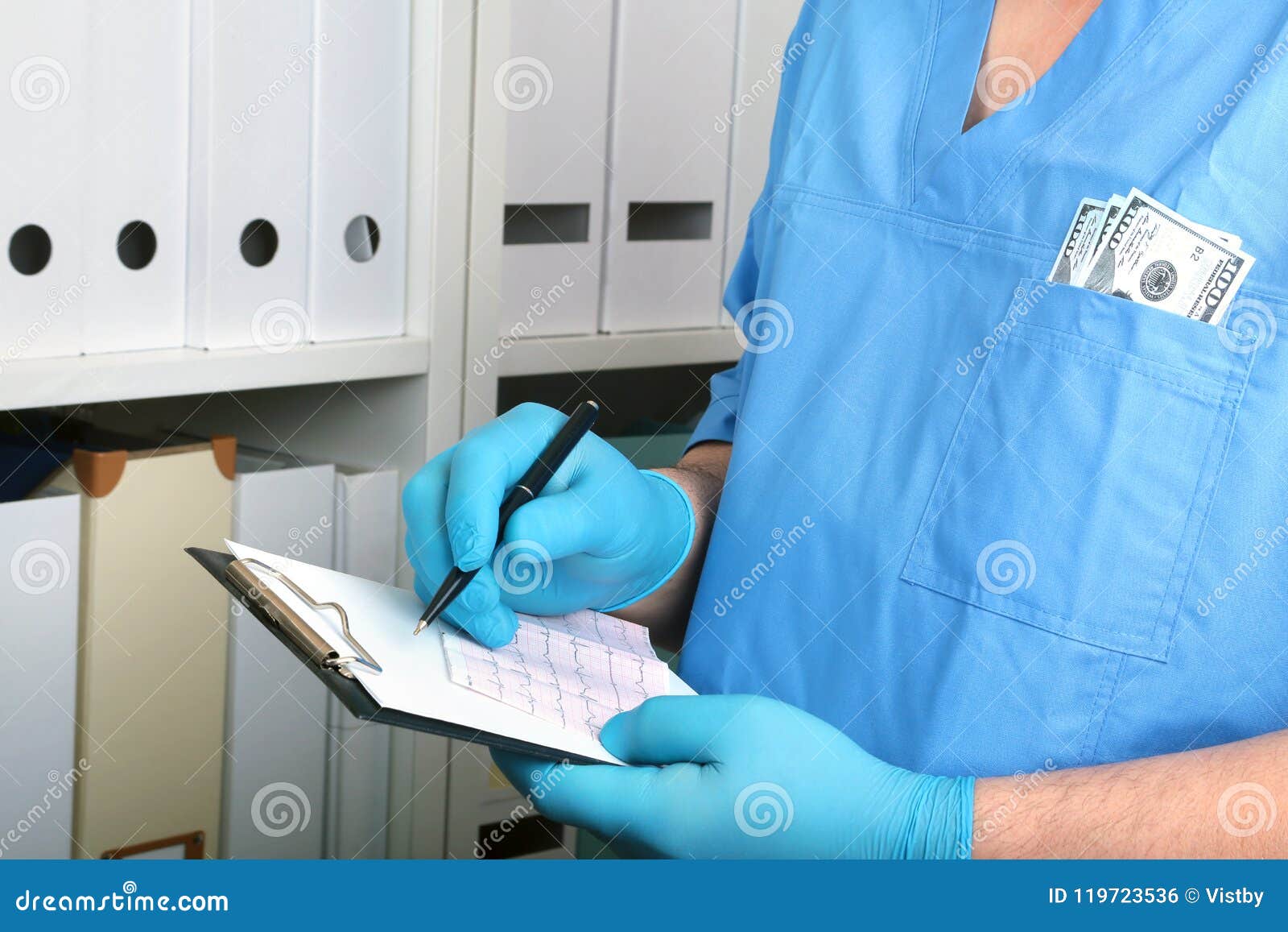 doctor in a blue uniforme write to the blank on a background of a shelf with folders. bribery and corruption concept