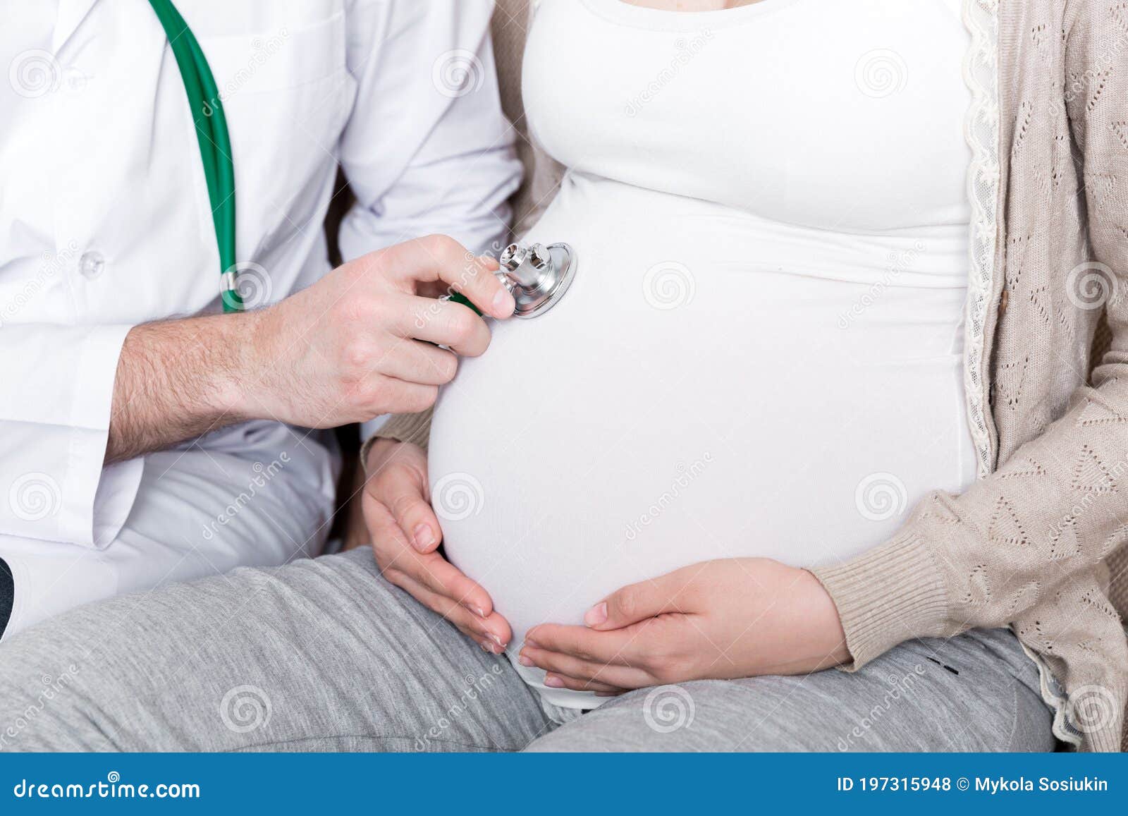 Doctor is Checking Pregnant Woman`s Belly with a Stethoscope. Physician is  Listening To a Heartbeat of a Baby Stock Photo - Image of expectant,  health: 197315948