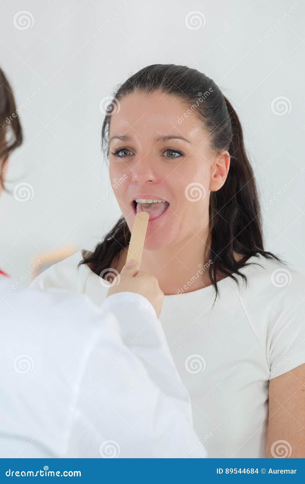 Doctor Checking Throat Young Patient Stock Photo Image of young