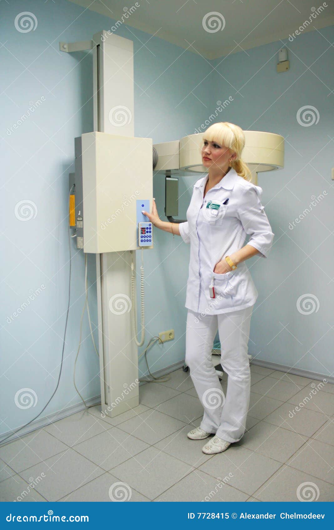 doctor connects the x-rays equipment